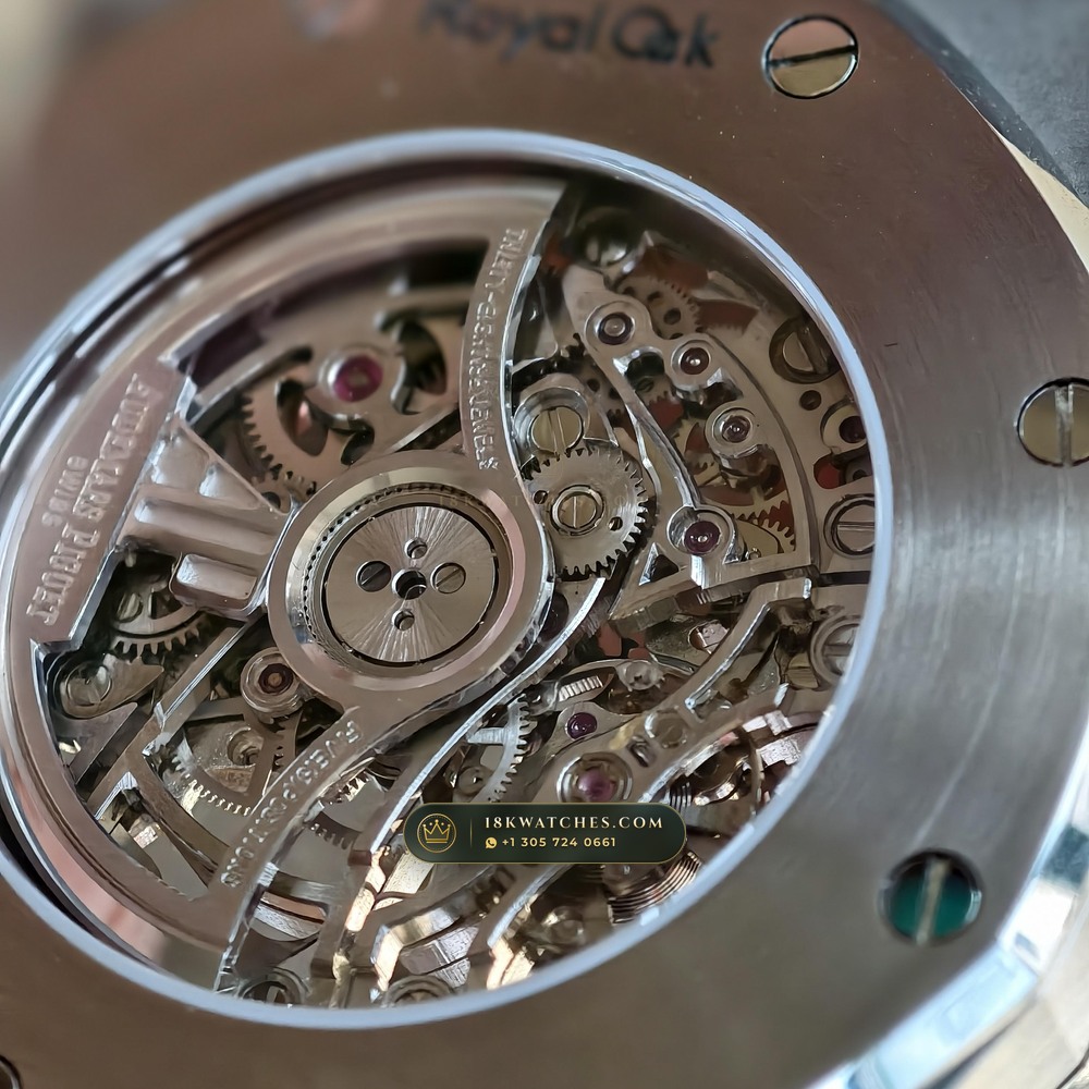 Audemars Piguet Royal Oak Double Balance Wheel Openworked 41mm Baguette Blue Topaz Bezel 18K White Gold Ref. 15412BC.TO.1220BC.01 — Studio Gallery Plate XIII in 18K White Gold Au750 (224.8g Verified Mass, Audemars Piguet Cal. 3132 Dual-Balance Openworked)