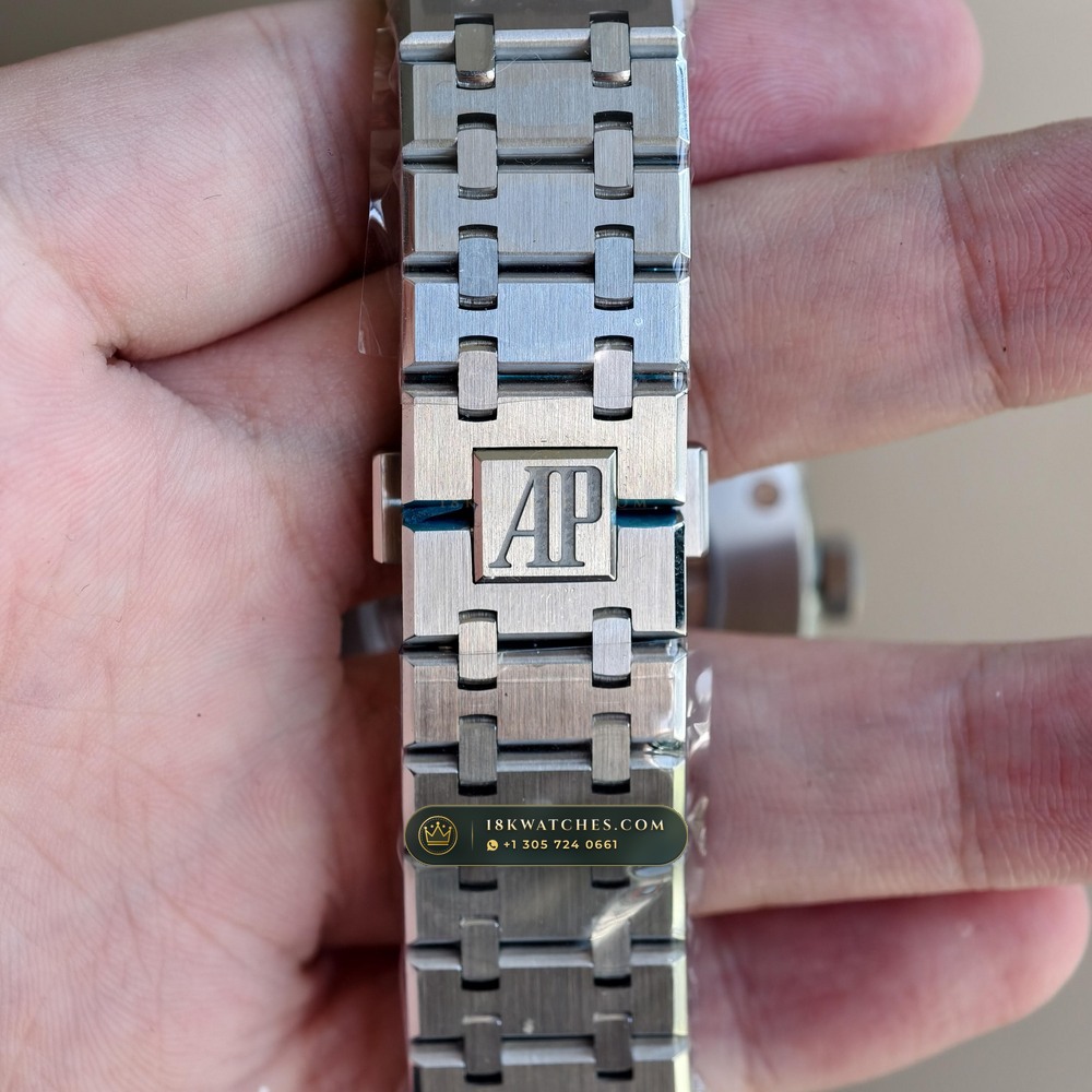 Audemars Piguet Royal Oak Double Balance Wheel Openworked 41mm Baguette Blue Topaz Bezel 18K White Gold Ref. 15412BC.TO.1220BC.01 — Studio Gallery Plate XV in 18K White Gold Au750 (224.8g Verified Mass, Audemars Piguet Cal. 3132 Dual-Balance Openworked)
