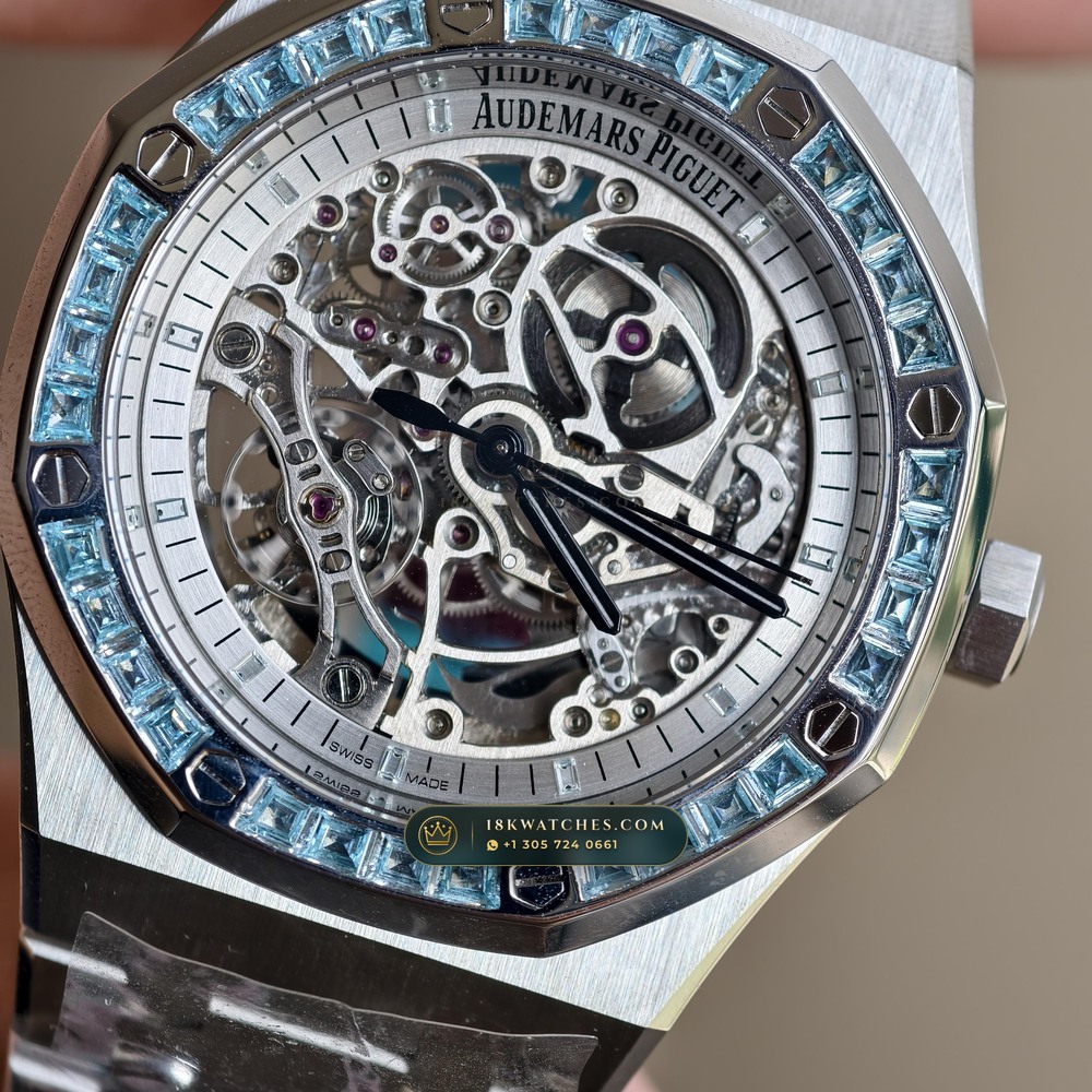 Audemars Piguet Royal Oak Double Balance Wheel Openworked 41mm Baguette Blue Topaz Bezel 18K White Gold Ref. 15412BC.TO.1220BC.01 — Studio Gallery Plate IV in 18K White Gold Au750 (224.8g Verified Mass, Audemars Piguet Cal. 3132 Dual-Balance Openworked)