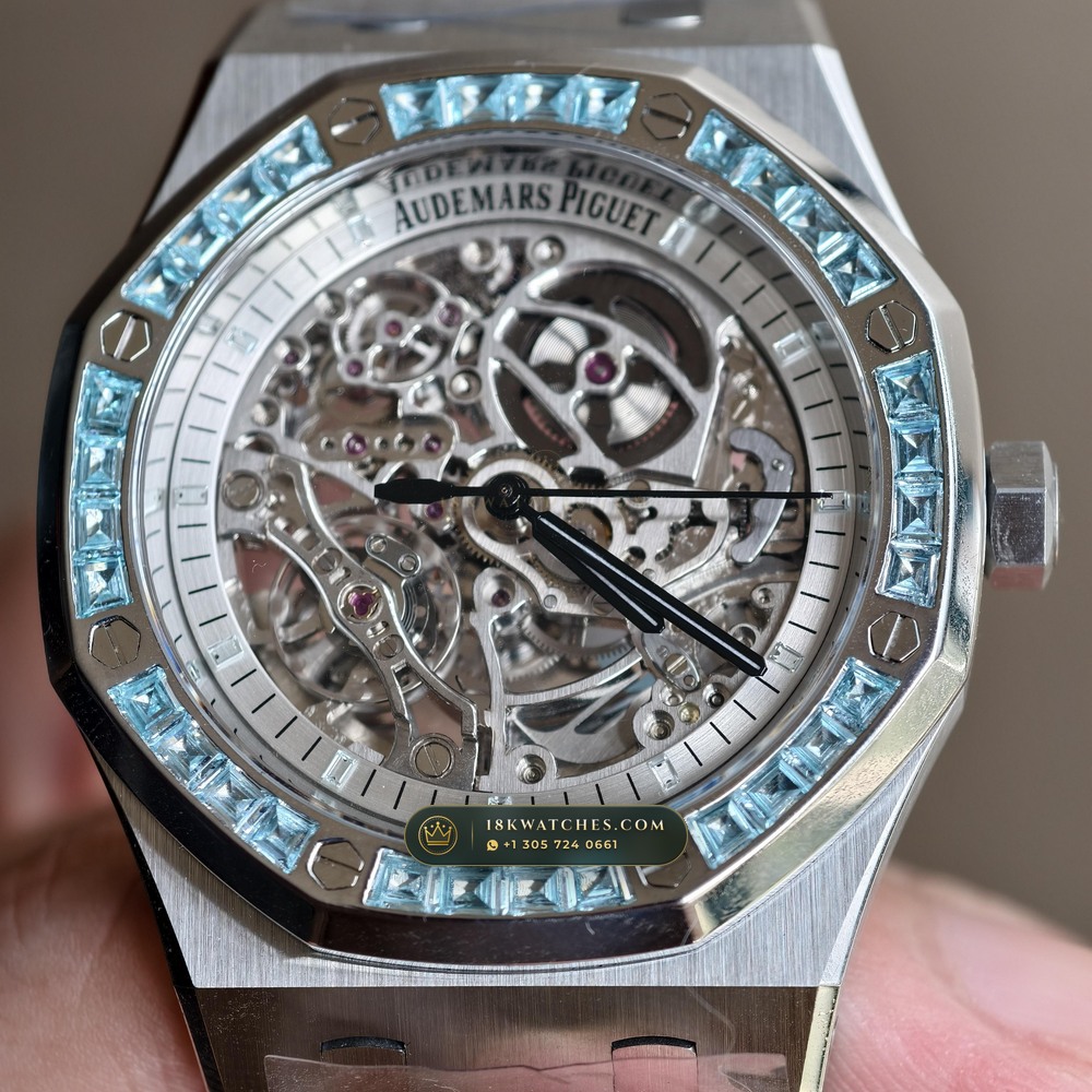 Audemars Piguet Royal Oak Double Balance Wheel Openworked 41mm Baguette Blue Topaz Bezel 18K White Gold Ref. 15412BC.TO.1220BC.01 — Studio Gallery Plate VII in 18K White Gold Au750 (224.8g Verified Mass, Audemars Piguet Cal. 3132 Dual-Balance Openworked)