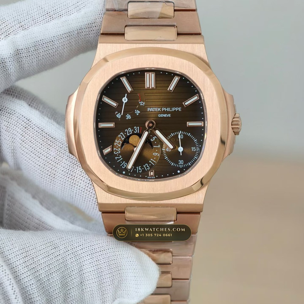 Patek Philippe Nautilus Moonphase & Power Reserve 18K Rose Gold Ref. 5712/1R — Studio Gallery Plate II in 18K Rose Gold Au750 (186.5g Verified Mass, Patek Philippe Cal. 240 PS IRM C LU - 22K Gold Micro-Rotor)
