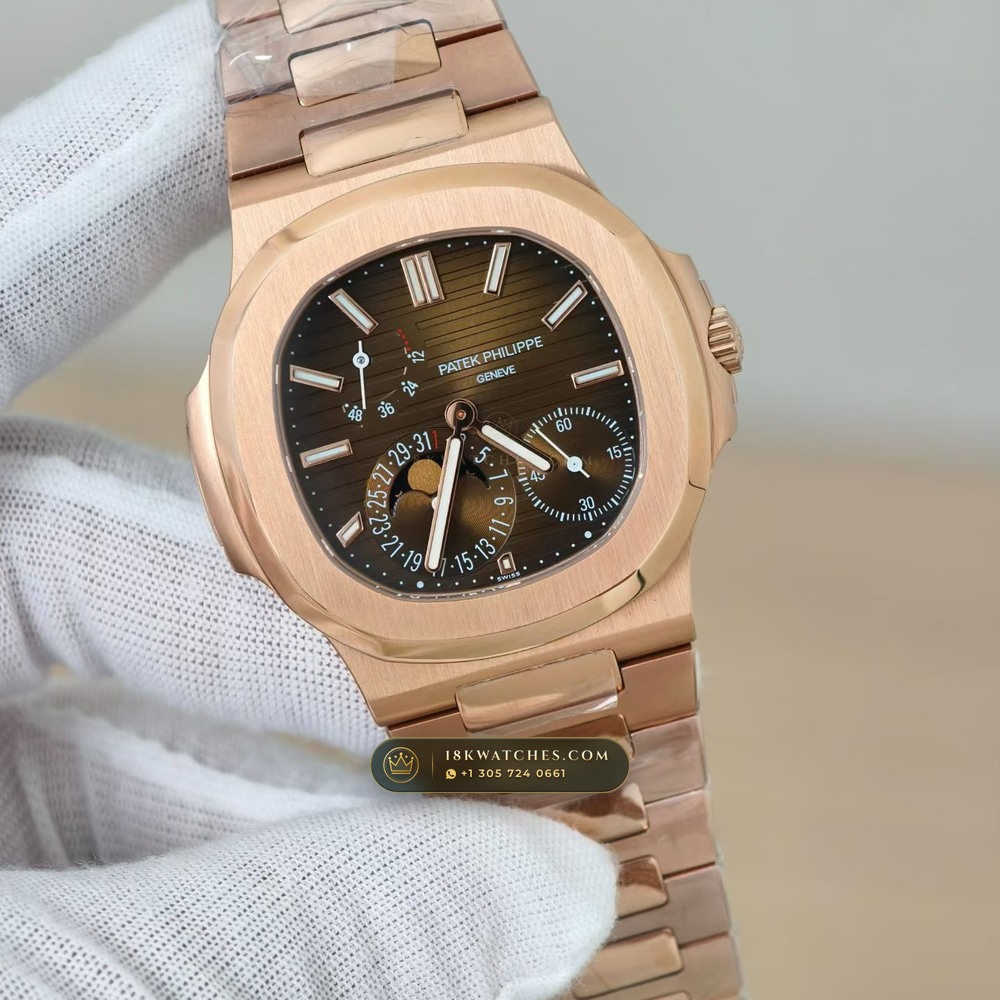Patek Philippe Nautilus Moonphase & Power Reserve 18K Rose Gold Ref. 5712/1R — Studio Gallery Plate III in 18K Rose Gold Au750 (186.5g Verified Mass, Patek Philippe Cal. 240 PS IRM C LU - 22K Gold Micro-Rotor)