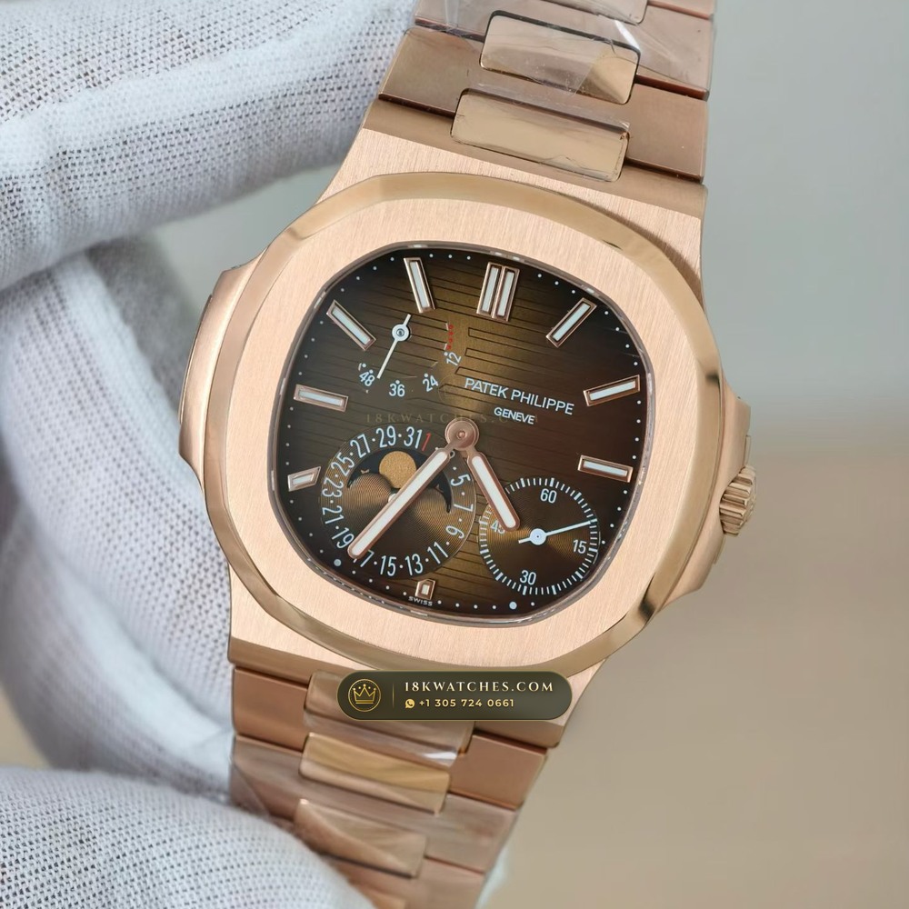 Patek Philippe Nautilus Moonphase & Power Reserve 18K Rose Gold Ref. 5712/1R — Studio Gallery Plate IV in 18K Rose Gold Au750 (186.5g Verified Mass, Patek Philippe Cal. 240 PS IRM C LU - 22K Gold Micro-Rotor)