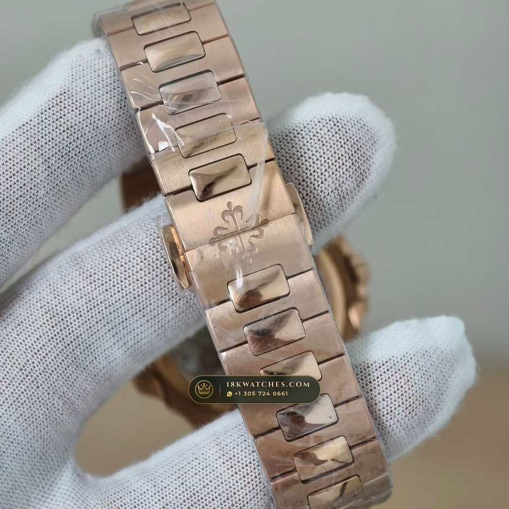 Patek Philippe Nautilus Moonphase & Power Reserve 18K Rose Gold Ref. 5712/1R — Studio Gallery Plate VII in 18K Rose Gold Au750 (186.5g Verified Mass, Patek Philippe Cal. 240 PS IRM C LU - 22K Gold Micro-Rotor)