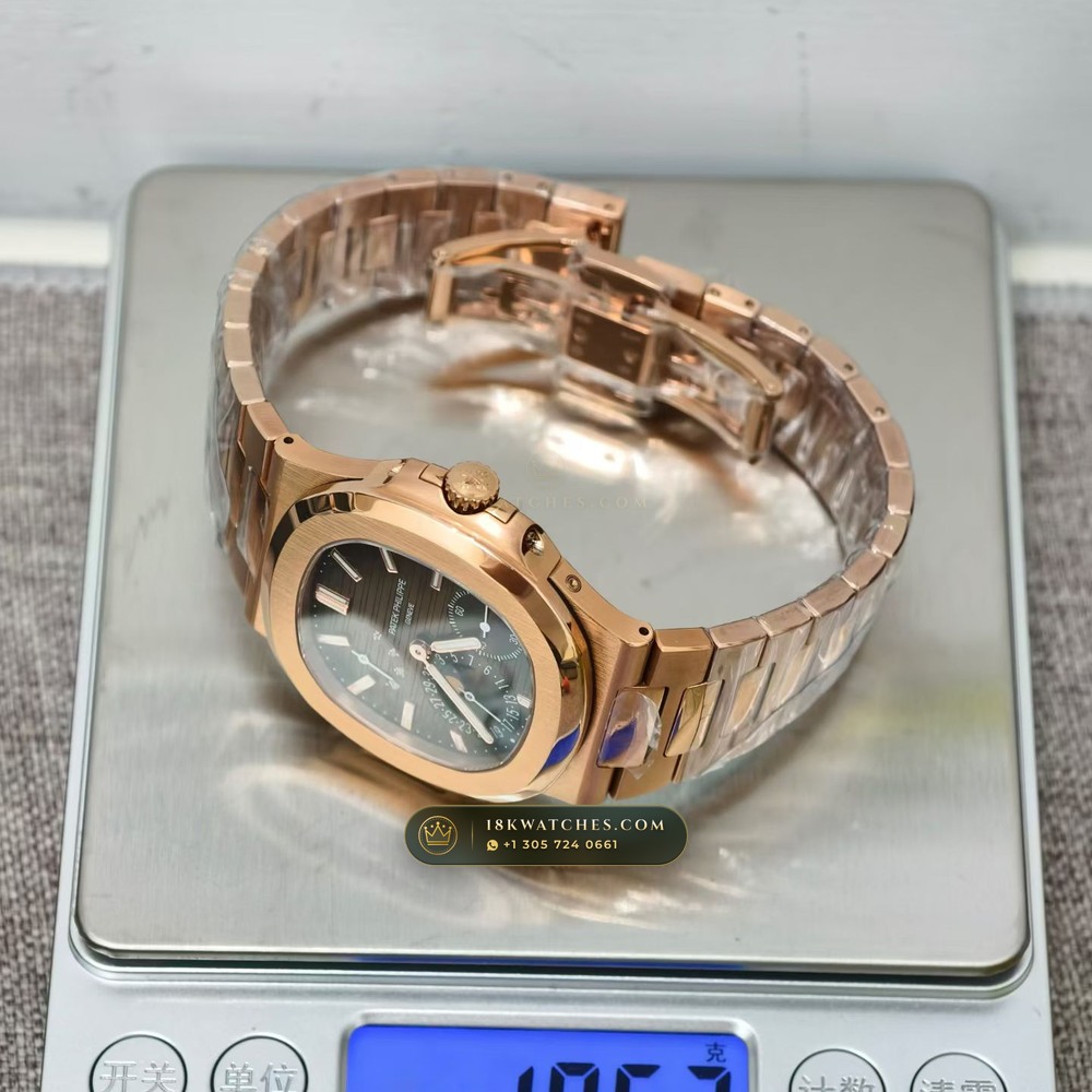Patek Philippe Nautilus Moonphase & Power Reserve 18K Rose Gold Ref. 5712/1R — Studio Gallery Plate IX in 18K Rose Gold Au750 (186.5g Verified Mass, Patek Philippe Cal. 240 PS IRM C LU - 22K Gold Micro-Rotor)