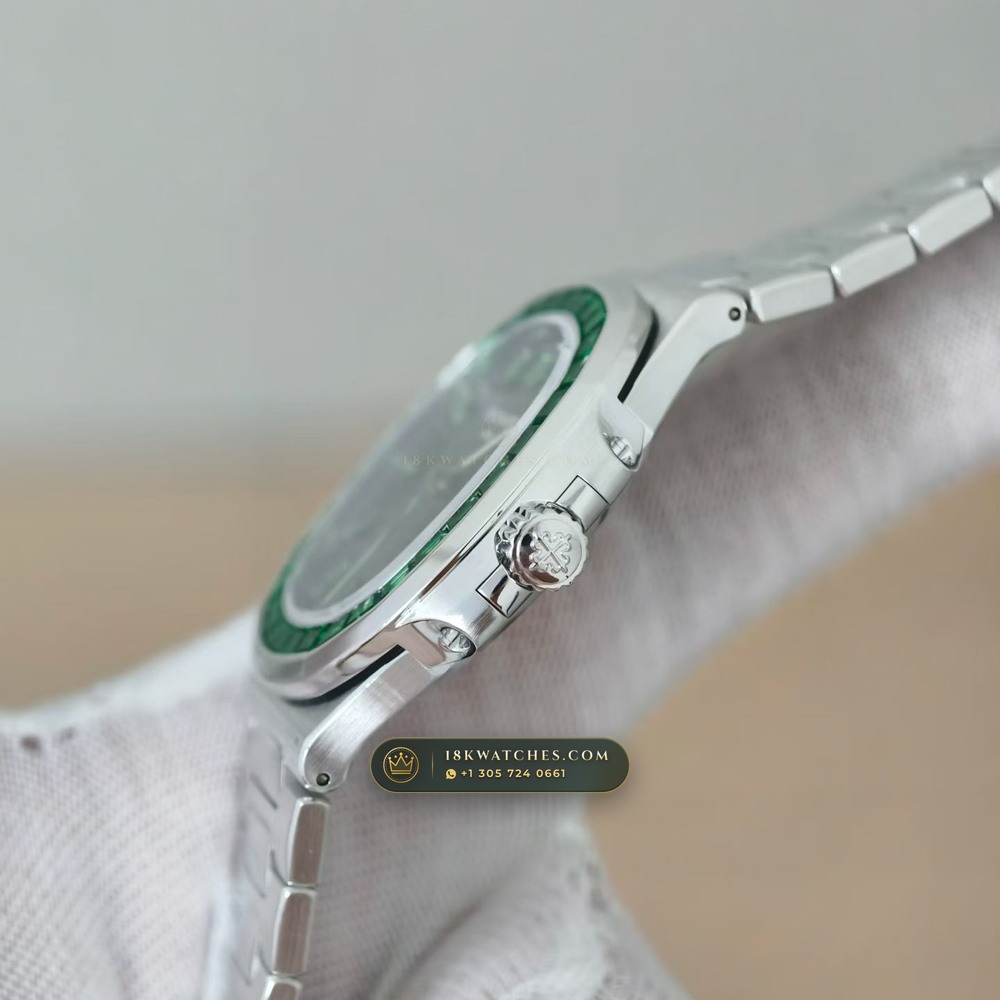 Patek Philippe Nautilus Self-Winding Baguette Emerald Bezel 950 Platinum Ref. 5711/113P-001 — Studio Gallery Plate IV in 950 Platinum Pt950 (245.4g Verified Mass, Patek Philippe Cal. 26-330 S C / Cal. 324 S C - 21K Gold Rotor)