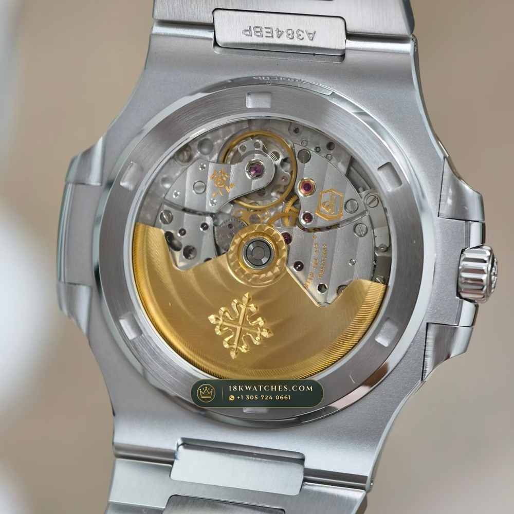 Patek Philippe Nautilus Self-Winding Baguette Emerald Bezel 950 Platinum Ref. 5711/113P-001 — Studio Gallery Plate V in 950 Platinum Pt950 (245.4g Verified Mass, Patek Philippe Cal. 26-330 S C / Cal. 324 S C - 21K Gold Rotor)