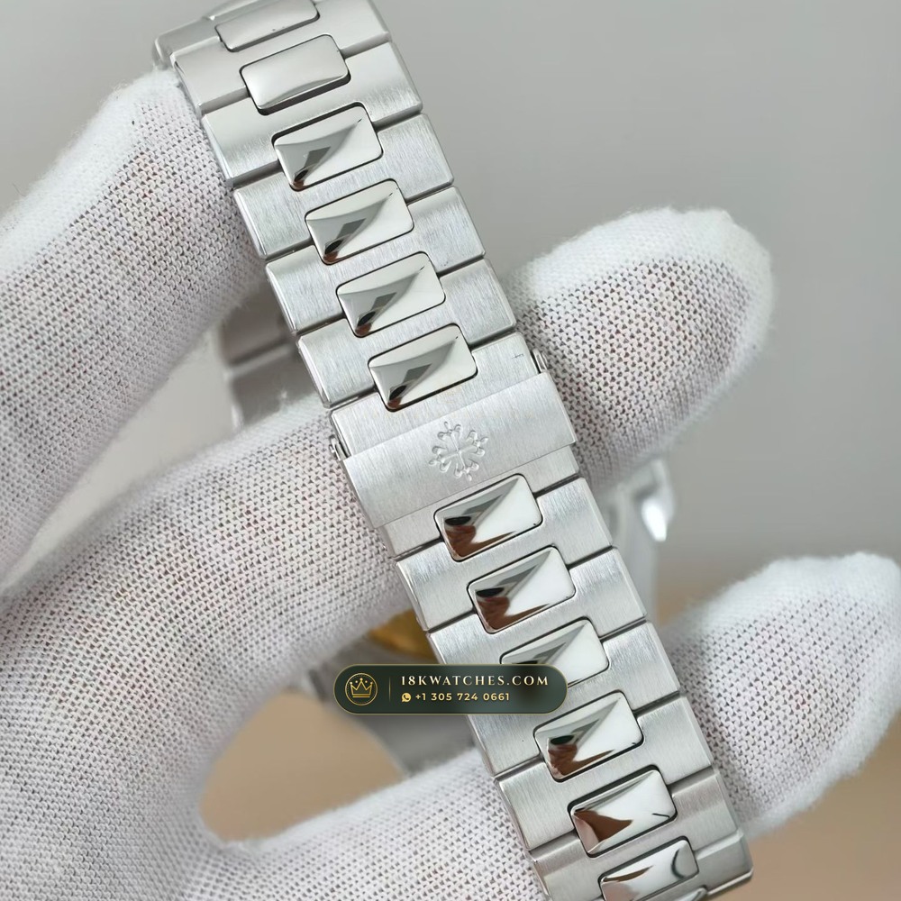 Patek Philippe Nautilus Self-Winding Baguette Emerald Bezel 950 Platinum Ref. 5711/113P-001 — Studio Gallery Plate VII in 950 Platinum Pt950 (245.4g Verified Mass, Patek Philippe Cal. 26-330 S C / Cal. 324 S C - 21K Gold Rotor)