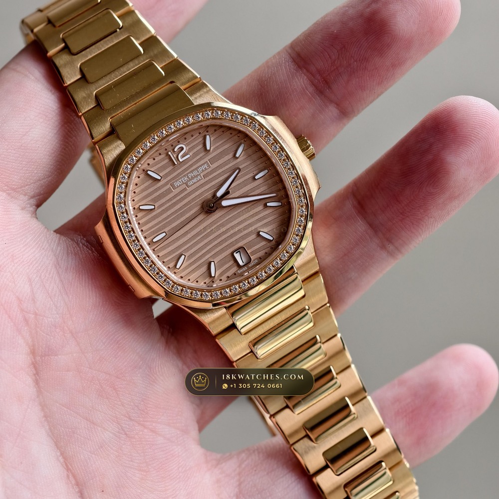 Patek Philippe Nautilus Ladies Automatic 18K Rose Gold Ref. 7118/1R — Studio Gallery Plate II in 18K Rose Gold Au750 (145.9g Verified Mass, Patek Philippe Cal. 324 S C - 21K Gold Rotor)