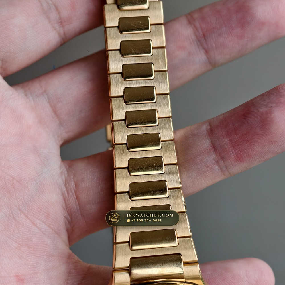 Patek Philippe Nautilus Ladies Automatic 18K Rose Gold Ref. 7118/1R — Studio Gallery Plate IX in 18K Rose Gold Au750 (145.9g Verified Mass, Patek Philippe Cal. 324 S C - 21K Gold Rotor)