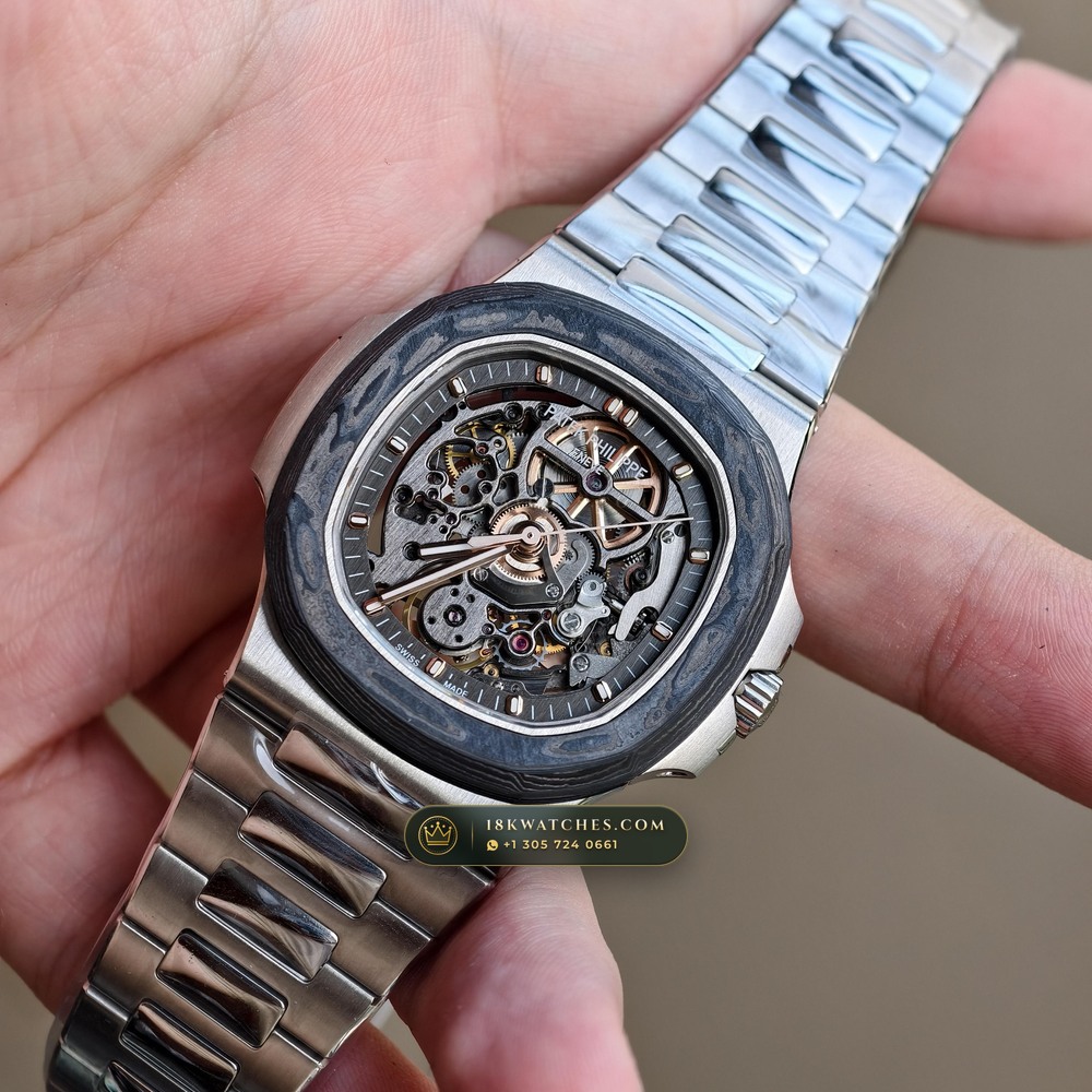 Patek Philippe Nautilus 40mm Openworked Carbon Edition Openworked Skeleton Dial Ref. 5711/1A-010 — Studio Gallery Plate III in Forged Carbon TPT & Titanium (115.2g Verified Mass, Patek Philippe Cal. 26-330 S C / Cal. 324 S C - 21K Gold Rotor)