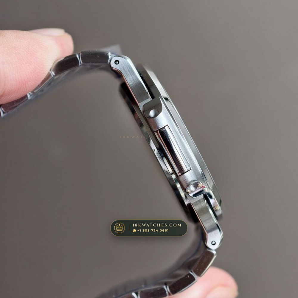 Patek Philippe Nautilus Off-Catalogue Baguette Emerald Bezel 950 Platinum Ref. 5711/113P-001 — Studio Gallery Plate V in 950 Platinum Pt950 (245.2g Verified Mass, Patek Philippe Cal. 26-330 S C / Cal. 324 S C - 21K Gold Rotor)