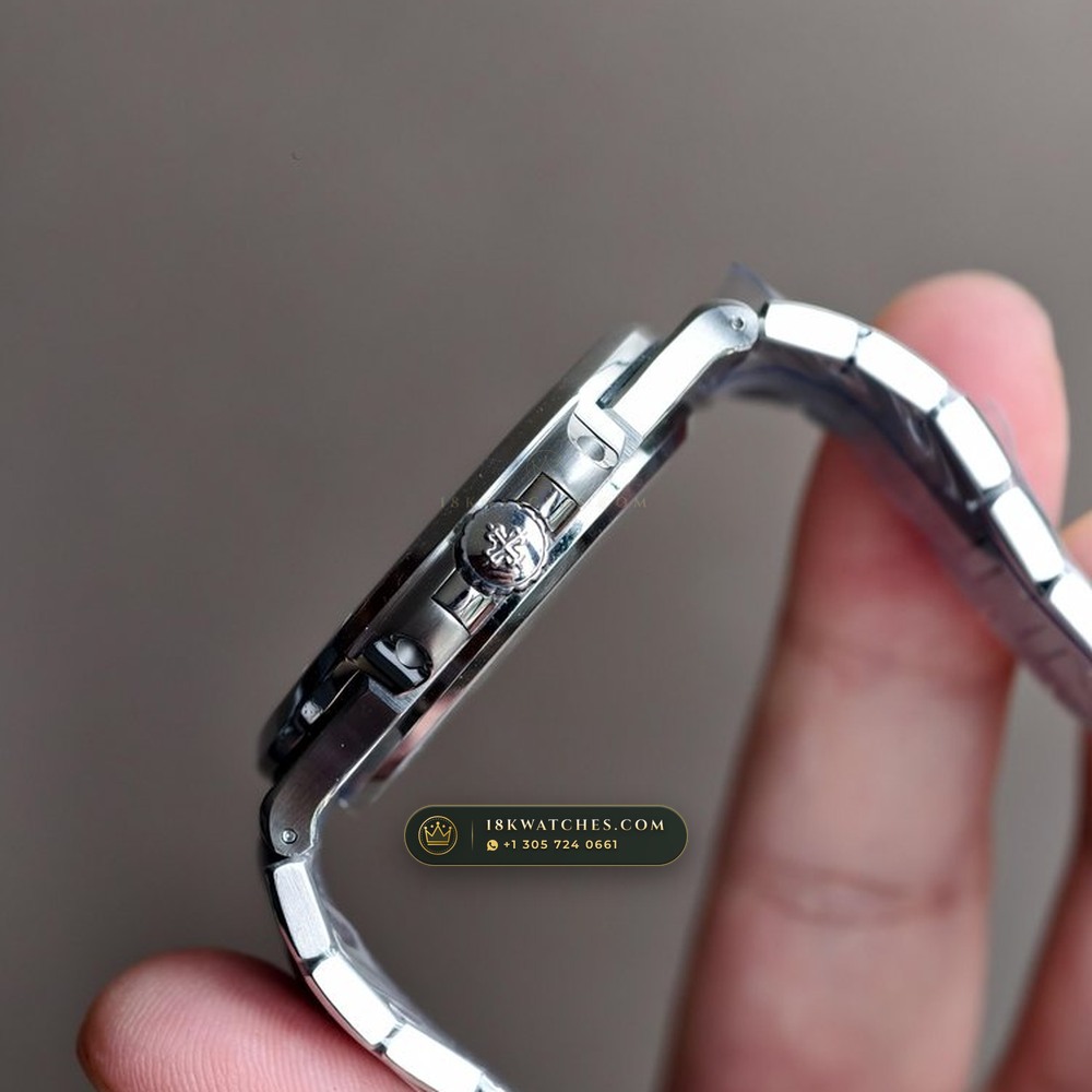 Patek Philippe Nautilus Off-Catalogue Baguette Emerald Bezel 950 Platinum Ref. 5711/113P-001 — Studio Gallery Plate VI in 950 Platinum Pt950 (245.2g Verified Mass, Patek Philippe Cal. 26-330 S C / Cal. 324 S C - 21K Gold Rotor)