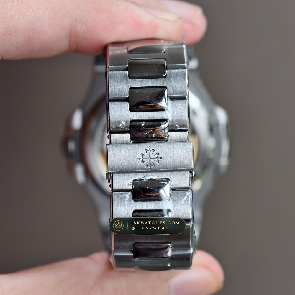 Patek Philippe Nautilus Off-Catalogue Baguette Emerald Bezel 950 Platinum Ref. 5711/113P-001 — Studio Gallery Plate VIII in 950 Platinum Pt950 (245.2g Verified Mass, Patek Philippe Cal. 26-330 S C / Cal. 324 S C - 21K Gold Rotor)
