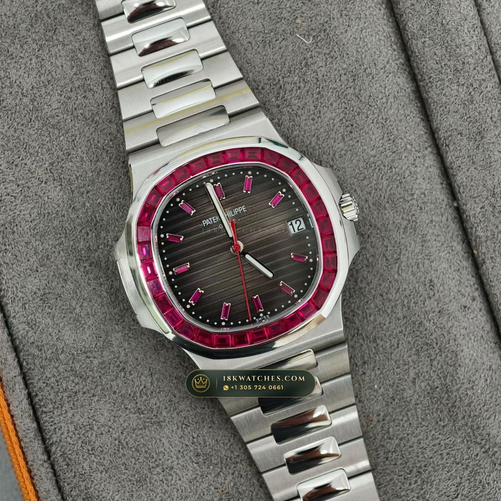Patek Philippe Nautilus Self-Winding Baguette Ruby Bezel 950 Platinum Ref. 5711/112P-001 — Studio Gallery Plate IV in 950 Platinum Pt950 (245.1g Verified Mass, Patek Philippe Cal. 26-330 S C / Cal. 324 S C - 21K Gold Rotor)