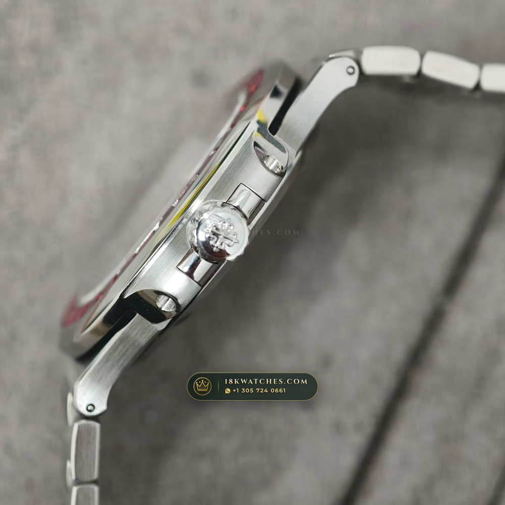 Patek Philippe Nautilus Self-Winding Baguette Ruby Bezel 950 Platinum Ref. 5711/112P-001 — Studio Gallery Plate VI in 950 Platinum Pt950 (245.1g Verified Mass, Patek Philippe Cal. 26-330 S C / Cal. 324 S C - 21K Gold Rotor)