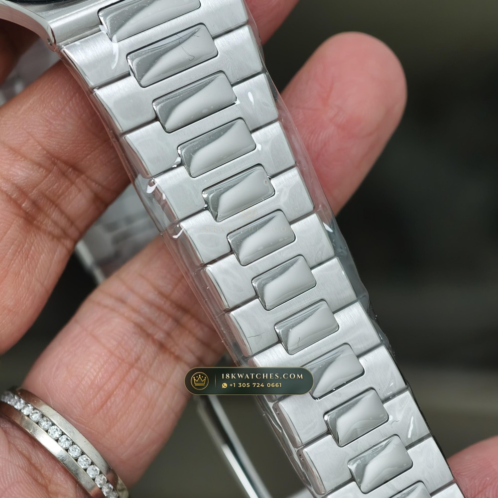 Patek Philippe Nautilus Off-Catalogue Baguette Ruby Bezel 950 Platinum Ref. 5711/112P-001 — Studio Gallery Plate X in 950 Platinum Pt950 (245.4g Verified Mass, Patek Philippe Cal. 26-330 S C / Cal. 324 S C - 21K Gold Rotor)