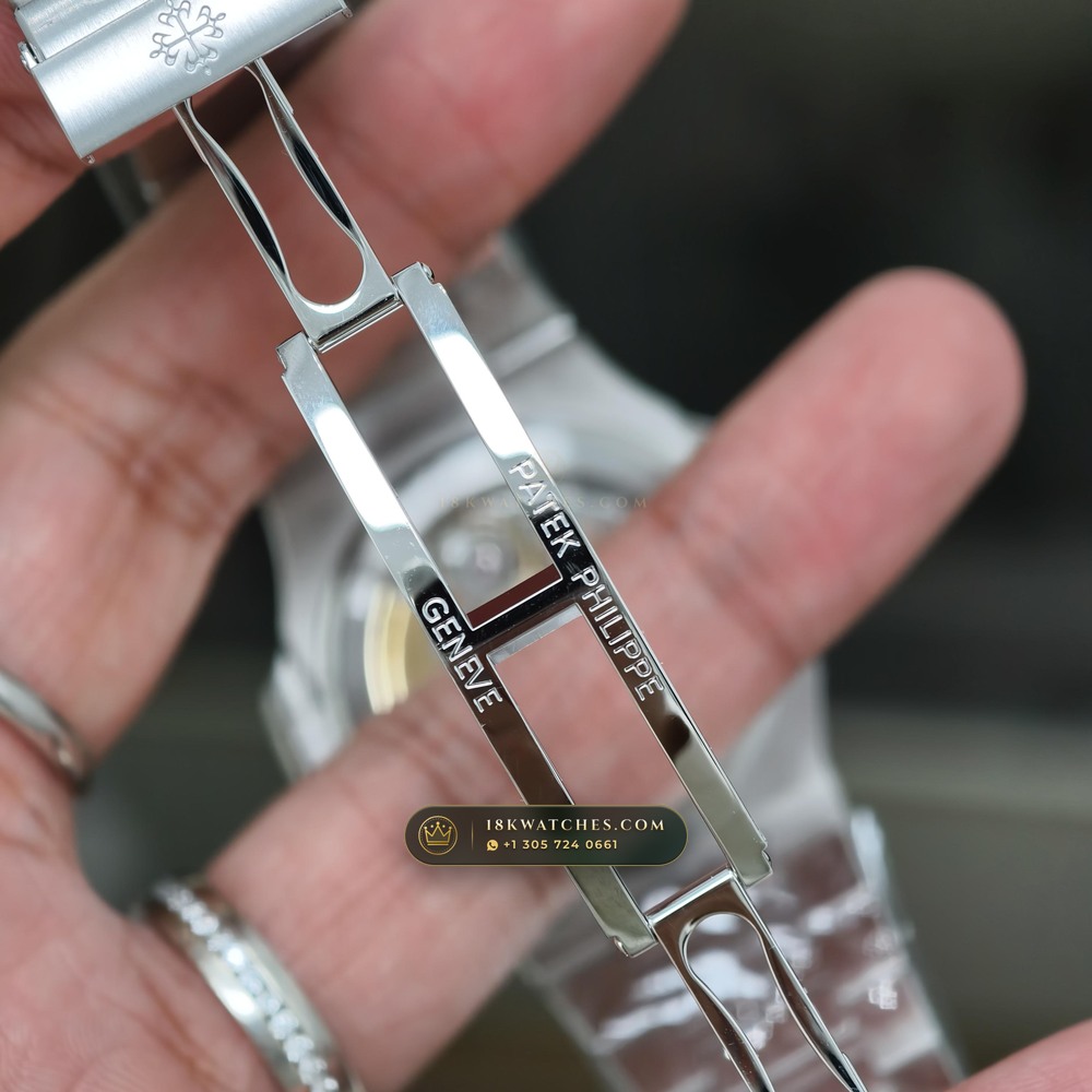 Patek Philippe Nautilus Off-Catalogue Baguette Ruby Bezel 950 Platinum Ref. 5711/112P-001 — Studio Gallery Plate XI in 950 Platinum Pt950 (245.4g Verified Mass, Patek Philippe Cal. 26-330 S C / Cal. 324 S C - 21K Gold Rotor)