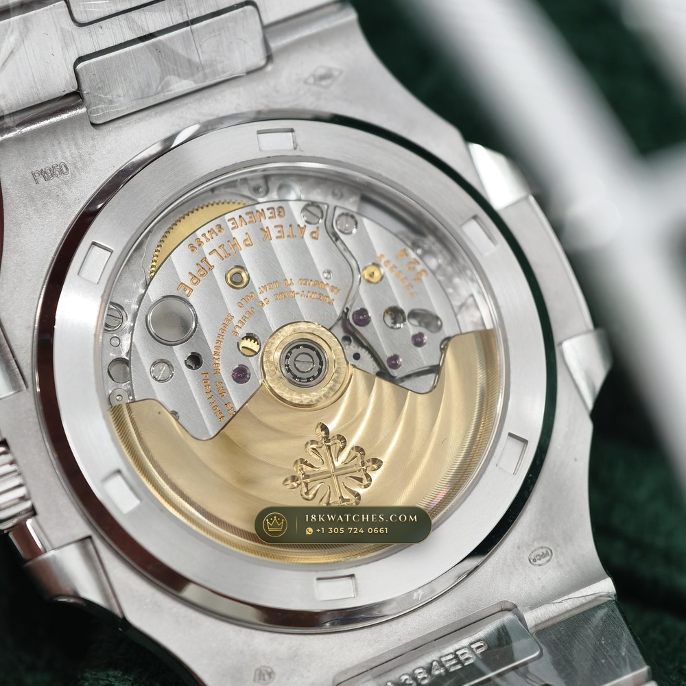 Patek Philippe Nautilus Off-Catalogue Baguette Ruby Bezel 950 Platinum Ref. 5711/112P-001 — Studio Gallery Plate VII in 950 Platinum Pt950 (245.4g Verified Mass, Patek Philippe Cal. 26-330 S C / Cal. 324 S C - 21K Gold Rotor)