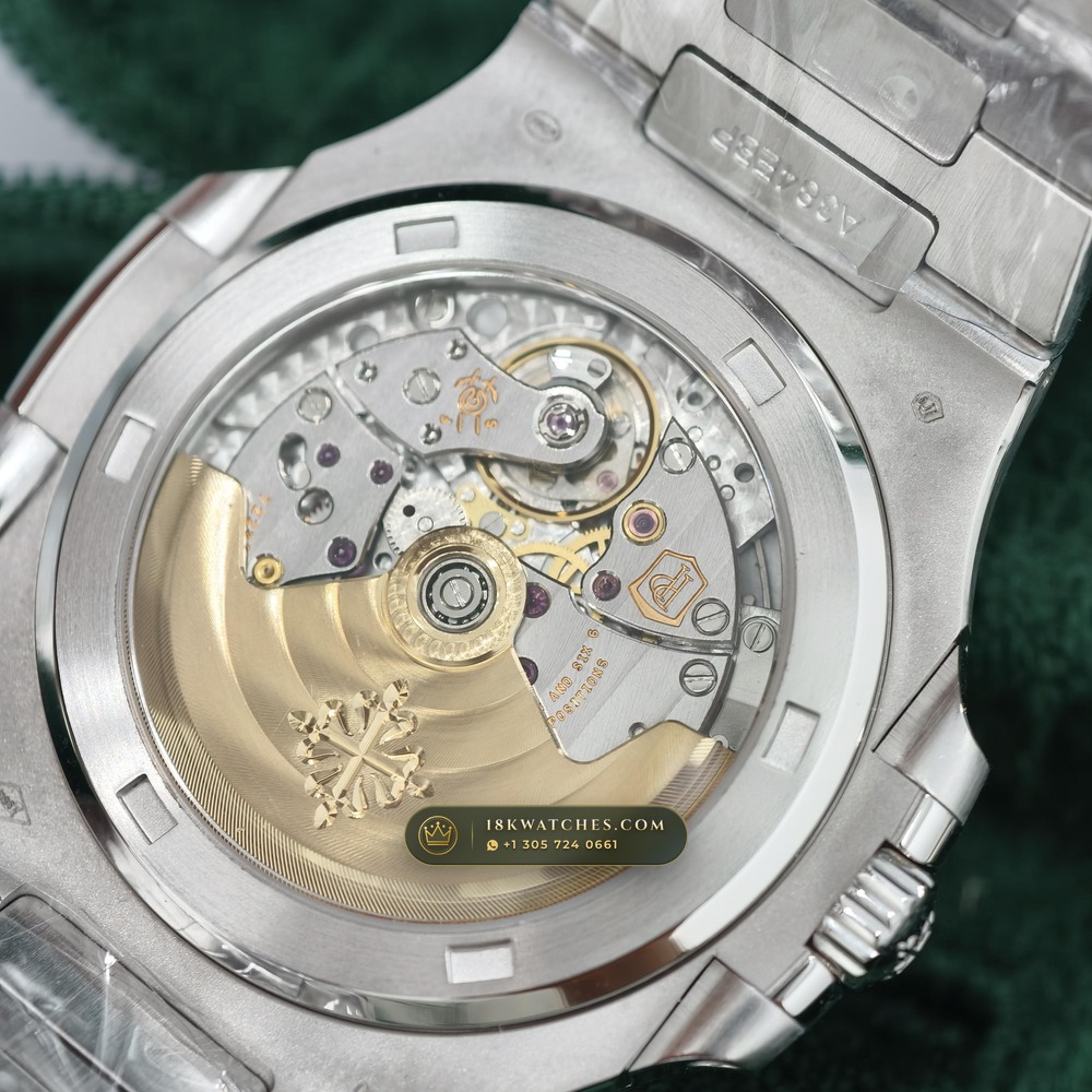 Patek Philippe Nautilus Off-Catalogue Baguette Ruby Bezel 950 Platinum Ref. 5711/112P-001 — Studio Gallery Plate VIII in 950 Platinum Pt950 (245.4g Verified Mass, Patek Philippe Cal. 26-330 S C / Cal. 324 S C - 21K Gold Rotor)