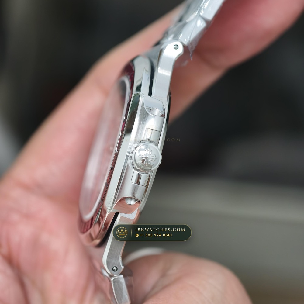 Patek Philippe Nautilus Off-Catalogue Baguette Ruby Bezel 950 Platinum Ref. 5711/112P-001 — Studio Gallery Plate IX in 950 Platinum Pt950 (245.4g Verified Mass, Patek Philippe Cal. 26-330 S C / Cal. 324 S C - 21K Gold Rotor)