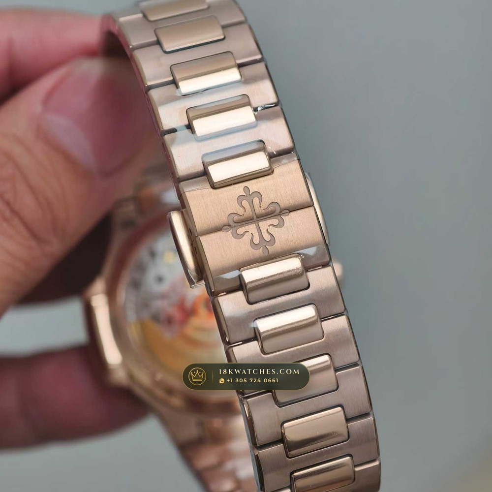 Patek Philippe Nautilus Ladies Automatic 18K Rose Gold Ref. 7118/1R-001 — Studio Gallery Plate V in 18K Rose Gold Au750 (145.8g Verified Mass, Patek Philippe Cal. 324 S C - 21K Gold Rotor)