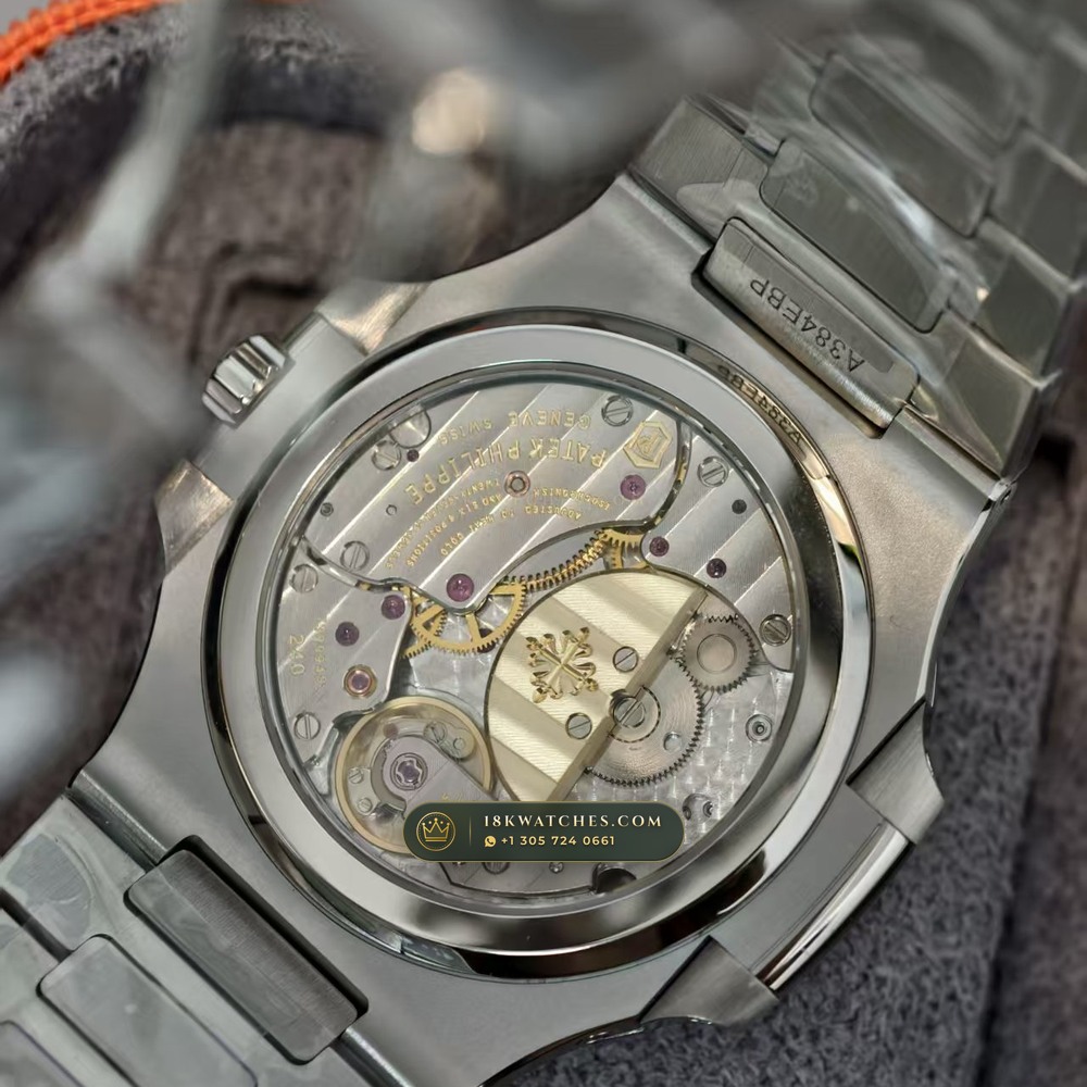 Patek Philippe Nautilus Moonphase & Power Reserve Custom SW Dial Free-Sprung Calibre Ref. 5712A — Studio Gallery Plate VIII in 904L Stainless Steel Custom Architecture (116.5g Verified Mass, Patek Philippe Cal. 240 PS IRM C LU - 22K Gold Micro-Rotor)