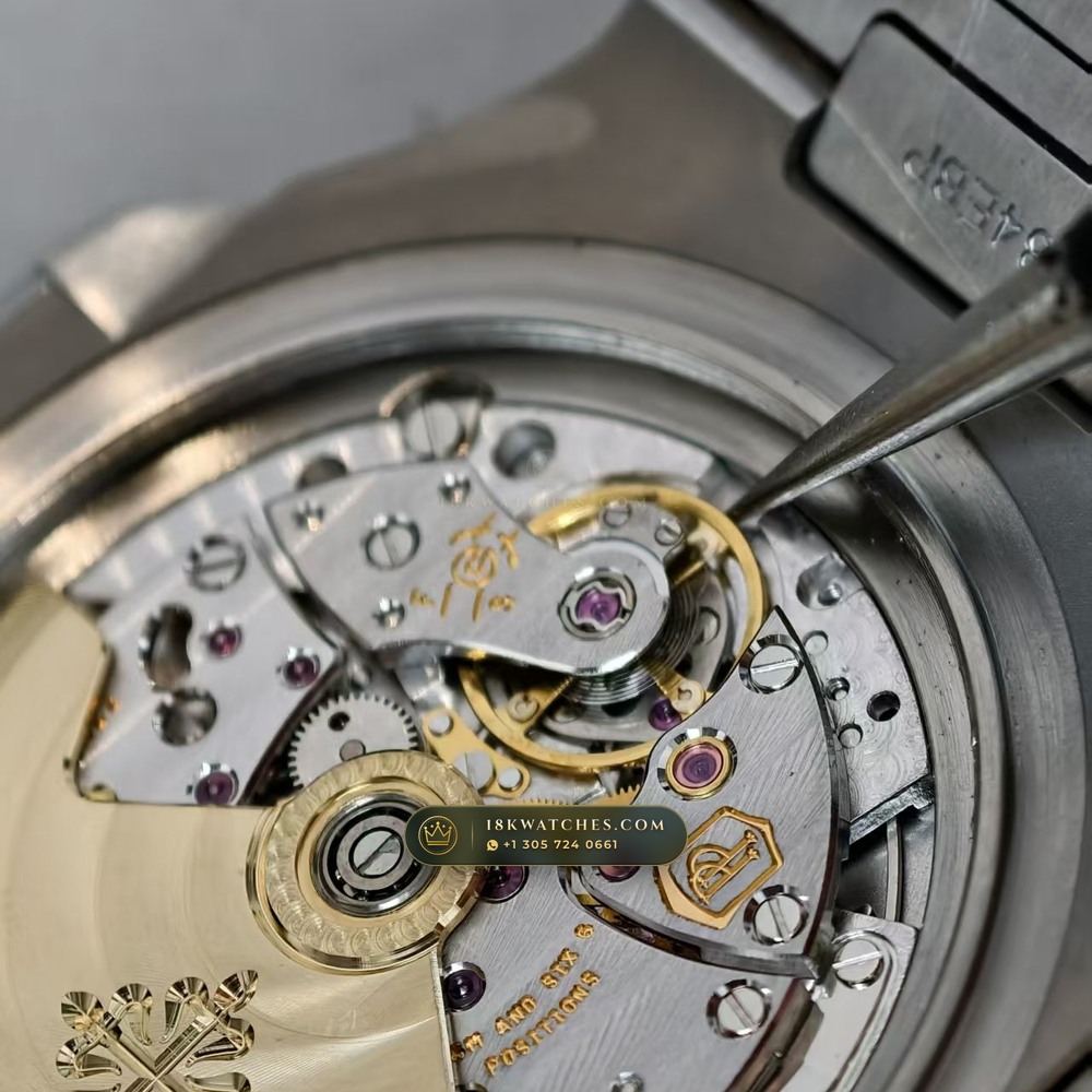 Patek Philippe Nautilus Self-Winding Custom SW Dial 22K Gold Rotor Ref. 5711/1A-001 — Studio Gallery Plate VIII in 904L Stainless Steel Custom Architecture (115.1g Verified Mass, Patek Philippe Cal. 26-330 S C / Cal. 324 S C - 21K Gold Rotor)