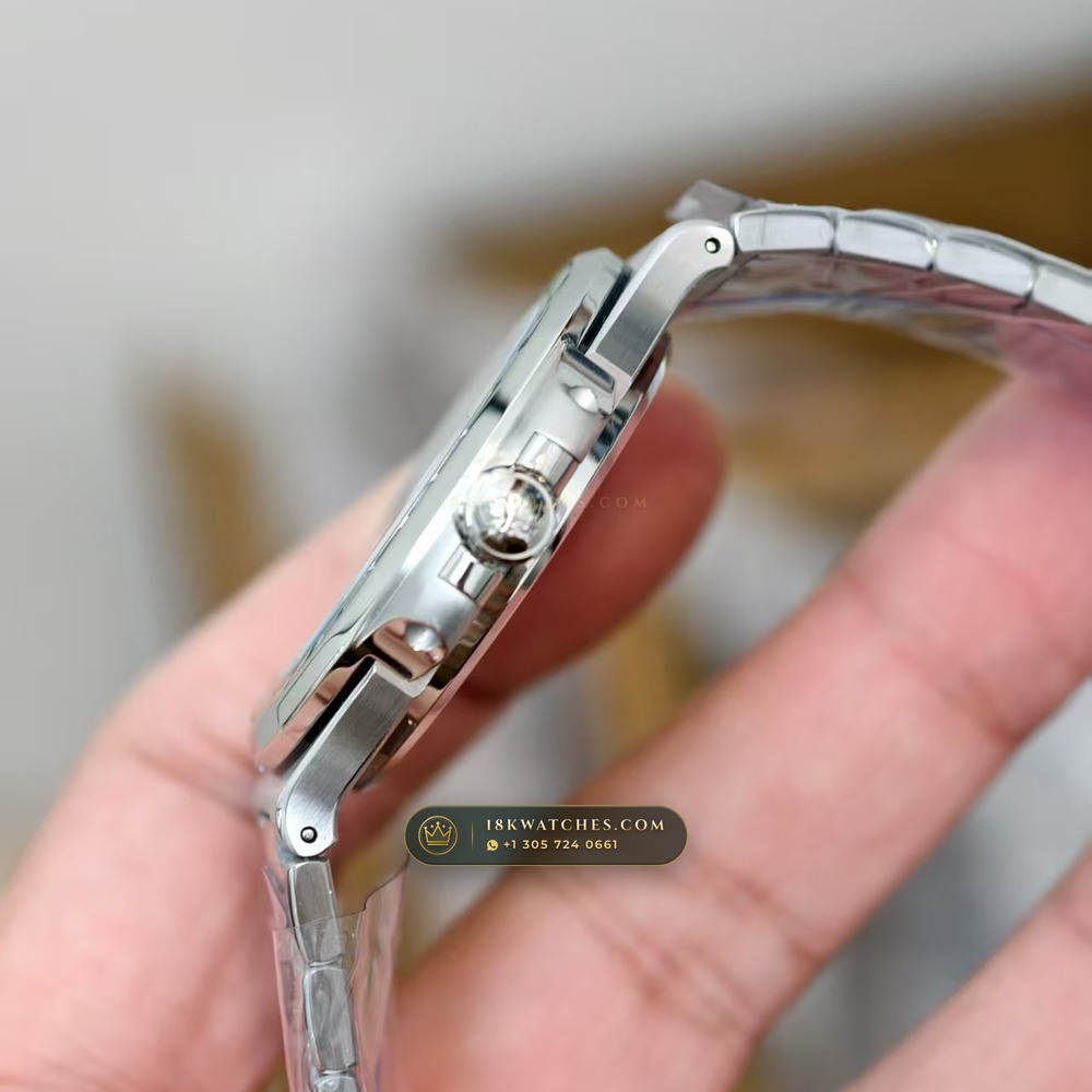 Patek Philippe Nautilus Off-Catalogue Baguette Emerald Bezel 950 Platinum Geneva Atelier Spec Ref. 5711/113P-001 — Studio Gallery Plate IV in 950 Platinum Pt950 (245.0g Verified Mass, Patek Philippe Cal. 26-330 S C / Cal. 324 S C - 21K Gold Rotor)