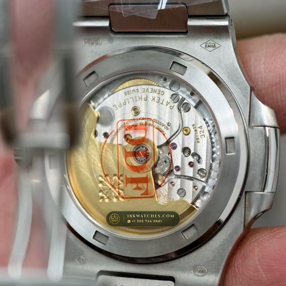 Patek Philippe Nautilus Off-Catalogue Baguette Emerald Bezel 950 Platinum Geneva Atelier Spec Ref. 5711/113P-001 — Studio Gallery Plate V in 950 Platinum Pt950 (245.0g Verified Mass, Patek Philippe Cal. 26-330 S C / Cal. 324 S C - 21K Gold Rotor)