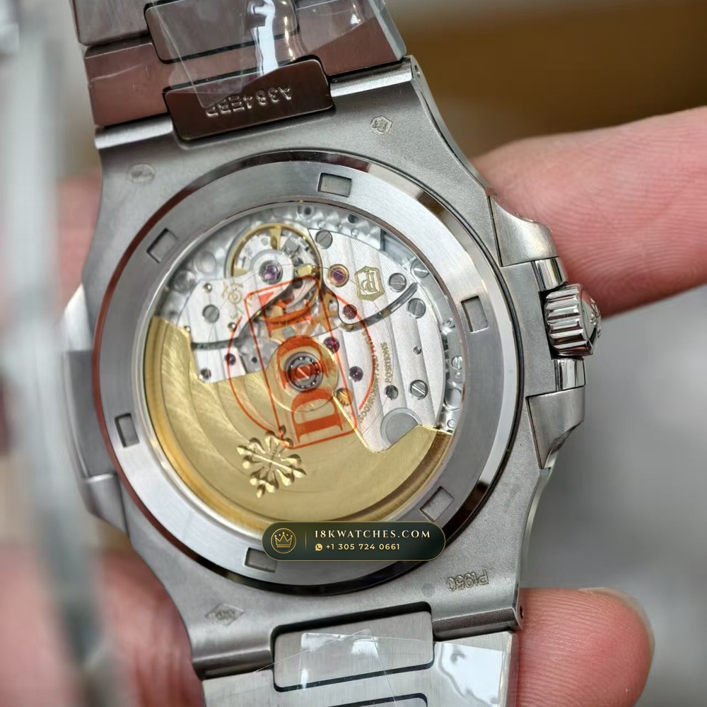 Patek Philippe Nautilus Off-Catalogue Baguette Emerald Bezel 950 Platinum Geneva Atelier Spec Ref. 5711/113P-001 — Studio Gallery Plate VI in 950 Platinum Pt950 (245.0g Verified Mass, Patek Philippe Cal. 26-330 S C / Cal. 324 S C - 21K Gold Rotor)