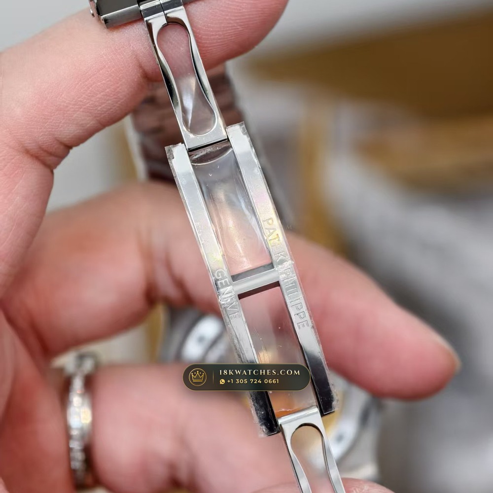 Patek Philippe Nautilus Off-Catalogue Baguette Emerald Bezel 950 Platinum Geneva Atelier Spec Ref. 5711/113P-001 — Studio Gallery Plate VII in 950 Platinum Pt950 (245.0g Verified Mass, Patek Philippe Cal. 26-330 S C / Cal. 324 S C - 21K Gold Rotor)