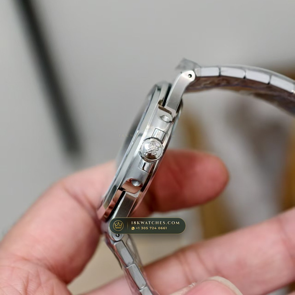 Patek Philippe Nautilus Off-Catalogue Baguette Blue Sapphire Bezel 950 Platinum Ref. 5711/111P-001 — Studio Gallery Plate IV in 950 Platinum Pt950 (245.4g Verified Mass, Patek Philippe Cal. 26-330 S C / Cal. 324 S C - 21K Gold Rotor)