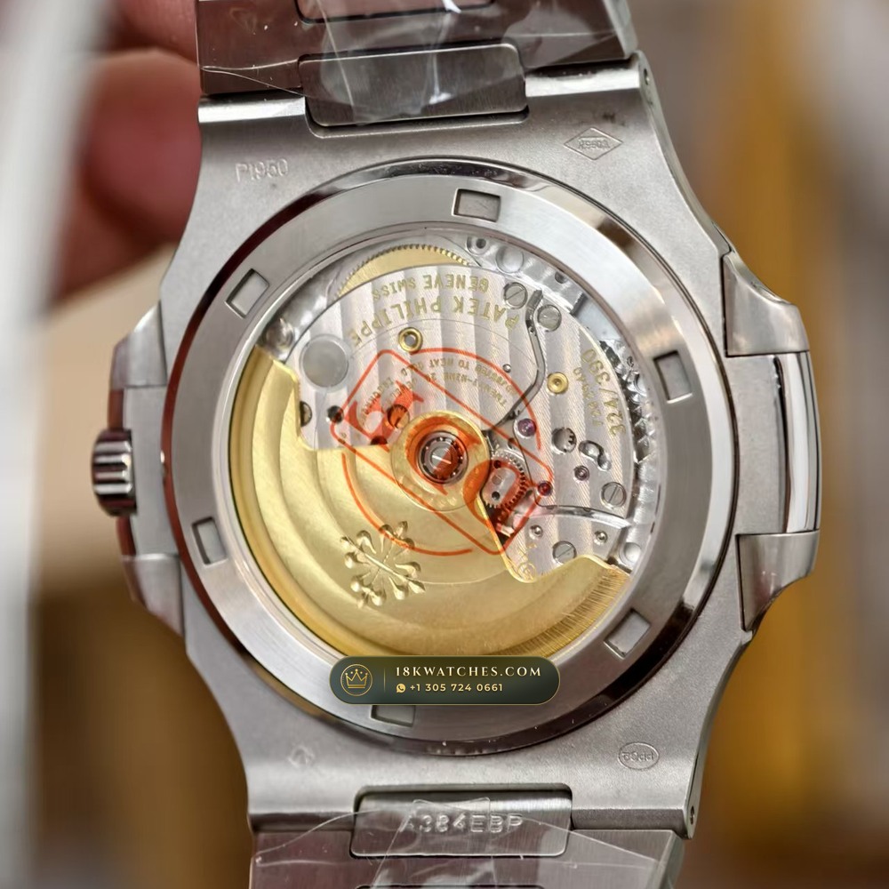 Patek Philippe Nautilus Off-Catalogue Baguette Blue Sapphire Bezel 950 Platinum Ref. 5711/111P-001 — Studio Gallery Plate V in 950 Platinum Pt950 (245.4g Verified Mass, Patek Philippe Cal. 26-330 S C / Cal. 324 S C - 21K Gold Rotor)
