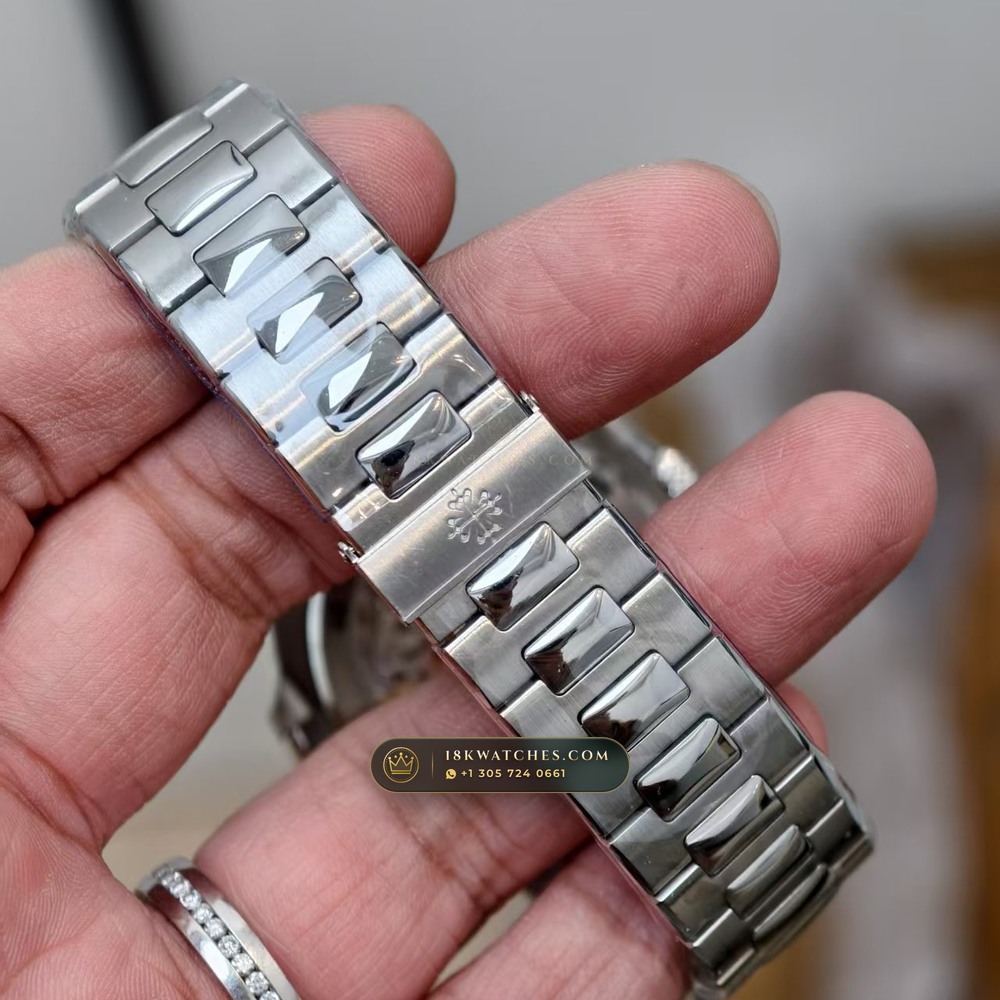 Patek Philippe Nautilus Off-Catalogue Baguette Blue Sapphire Bezel 950 Platinum Ref. 5711/111P-001 — Studio Gallery Plate VI in 950 Platinum Pt950 (245.4g Verified Mass, Patek Philippe Cal. 26-330 S C / Cal. 324 S C - 21K Gold Rotor)