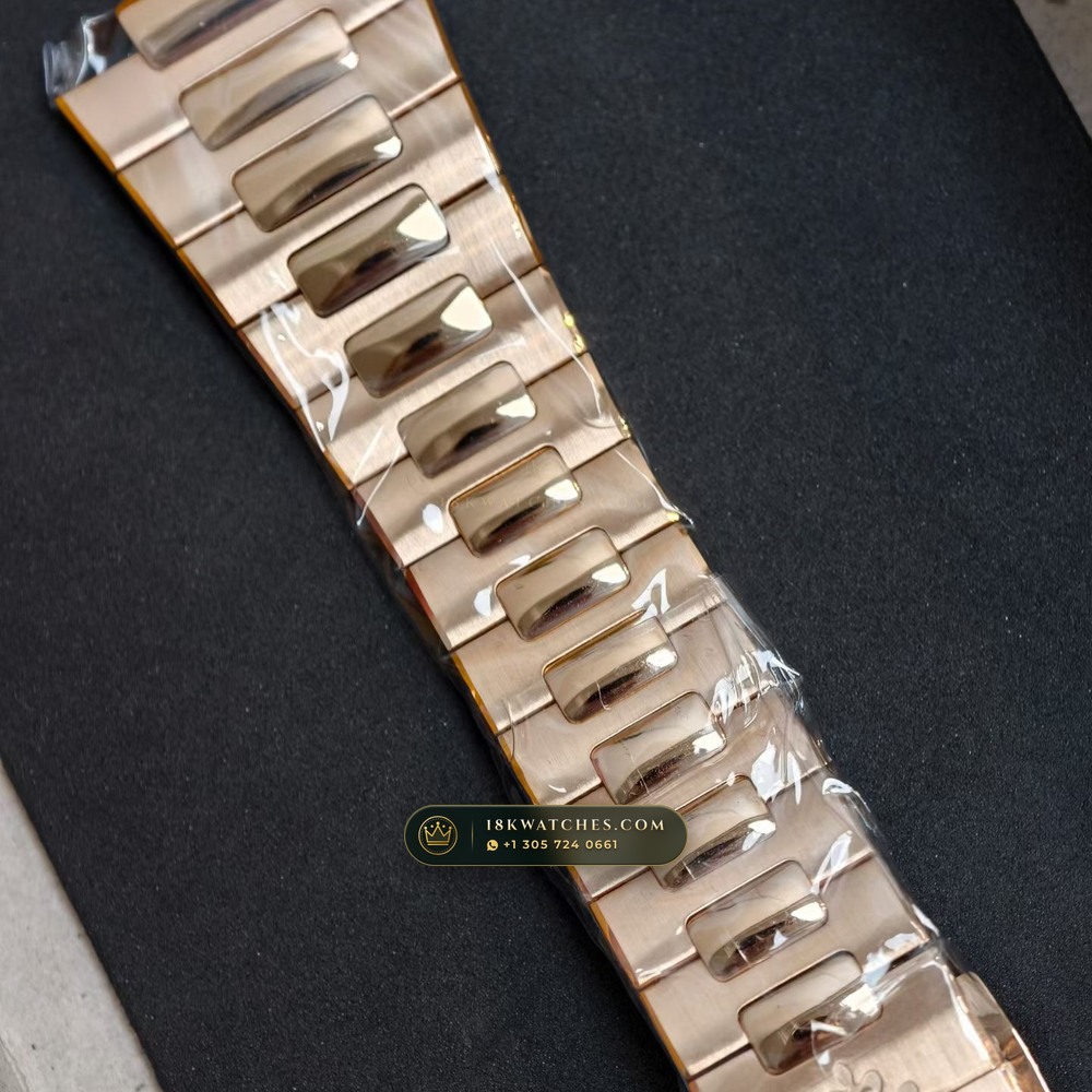 Patek Philippe Nautilus Moonphase & Power Reserve Full Solid 18K Rose Gold Bracelet Ref. 5712/1R-001 — Studio Gallery Plate II in 18K Rose Gold Au750 (185.2g Verified Mass, Patek Philippe Cal. 240 PS IRM C LU - 22K Gold Micro-Rotor)