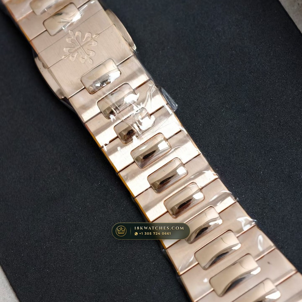 Patek Philippe Nautilus Moonphase & Power Reserve Full Solid 18K Rose Gold Bracelet Ref. 5712/1R-001 — Studio Gallery Plate III in 18K Rose Gold Au750 (185.2g Verified Mass, Patek Philippe Cal. 240 PS IRM C LU - 22K Gold Micro-Rotor)
