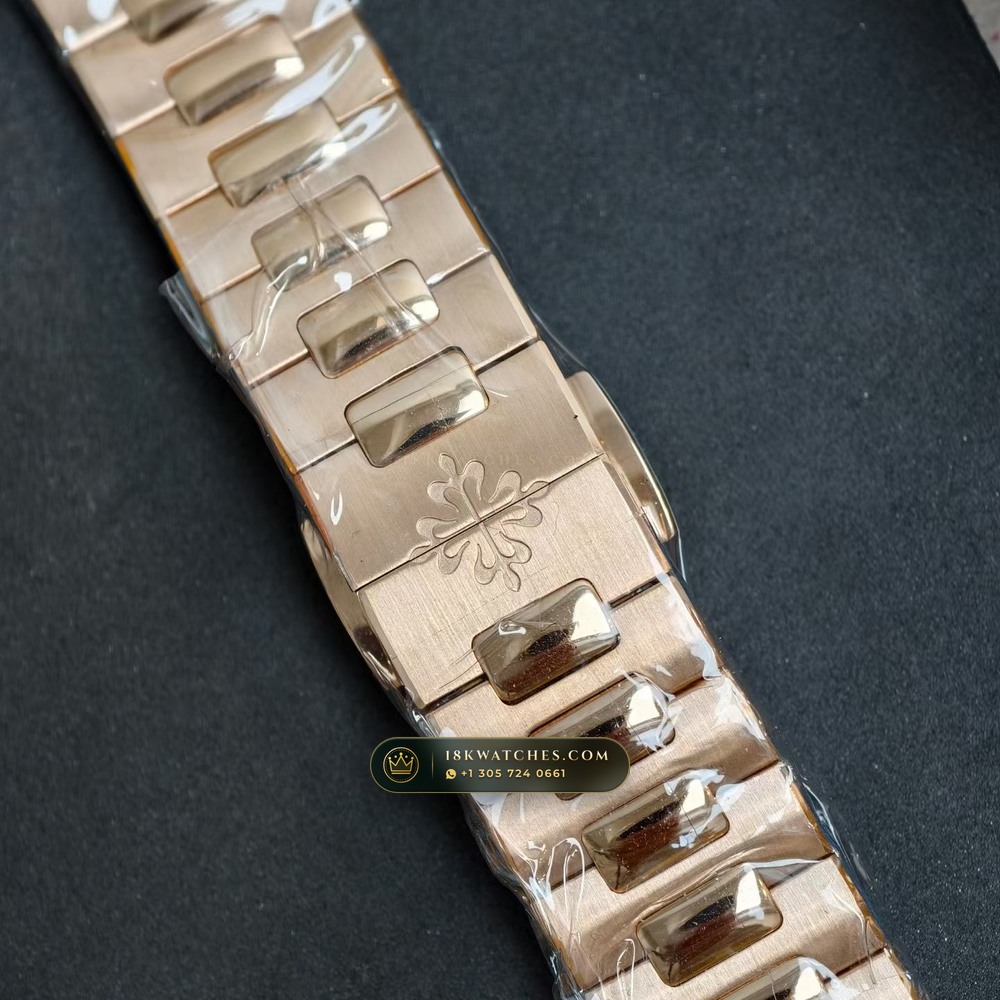 Patek Philippe Nautilus Moonphase & Power Reserve Full Solid 18K Rose Gold Bracelet Ref. 5712/1R-001 — Studio Gallery Plate VII in 18K Rose Gold Au750 (185.2g Verified Mass, Patek Philippe Cal. 240 PS IRM C LU - 22K Gold Micro-Rotor)