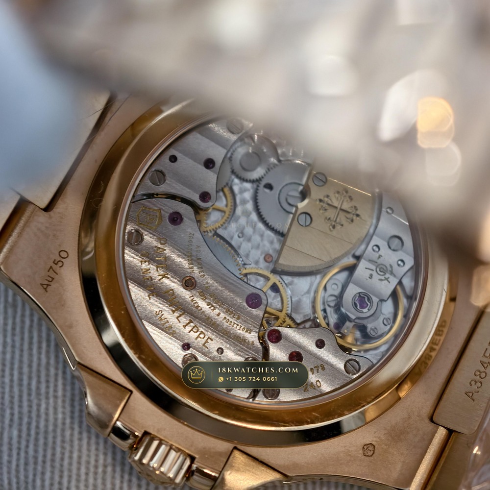 Patek Philippe Nautilus Moonphase & Power Reserve Diamond-Set Bezel 18K Rose Gold Ref. 5712R — Studio Gallery Plate VIII in 18K Rose Gold Au750 (106.0g Verified Mass, Patek Philippe Cal. 240 PS IRM C LU - 22K Gold Micro-Rotor)