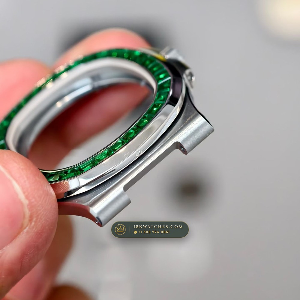 Patek Philippe Nautilus Self-Winding Baguette Emerald Bezel 950 Platinum Geneva Atelier Spec Ref. 5711/113P-001 — Studio Gallery Plate III in 950 Platinum Pt950 (244.6g Verified Mass, Patek Philippe Cal. 26-330 S C / Cal. 324 S C - 21K Gold Rotor)