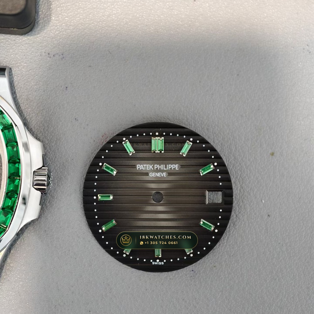Patek Philippe Nautilus Self-Winding Baguette Emerald Bezel 950 Platinum Geneva Atelier Spec Ref. 5711/113P-001 — Studio Gallery Plate IV in 950 Platinum Pt950 (244.6g Verified Mass, Patek Philippe Cal. 26-330 S C / Cal. 324 S C - 21K Gold Rotor)