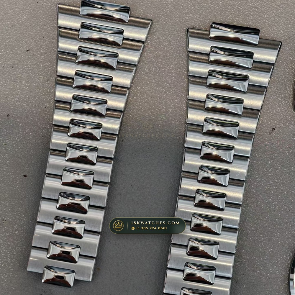 Patek Philippe Nautilus Self-Winding Baguette Emerald Bezel 950 Platinum Geneva Atelier Spec Ref. 5711/113P-001 — Studio Gallery Plate VII in 950 Platinum Pt950 (244.6g Verified Mass, Patek Philippe Cal. 26-330 S C / Cal. 324 S C - 21K Gold Rotor)