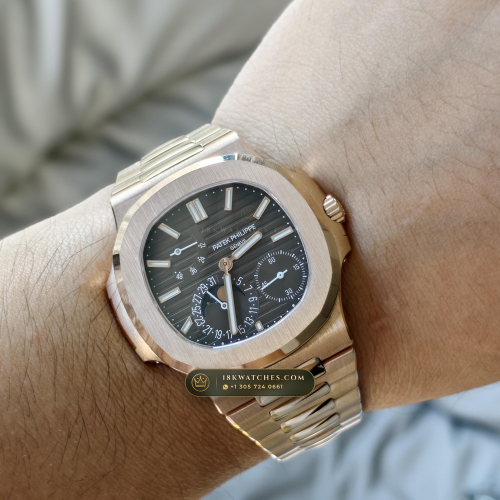 Patek Philippe Nautilus Moonphase & Power Reserve 18K Rose Gold Ref. 5712R/001 — Studio Gallery Plate X in 18K Rose Gold Au750 (105.9g Verified Mass, Patek Philippe Cal. 240 PS IRM C LU - 22K Gold Micro-Rotor)