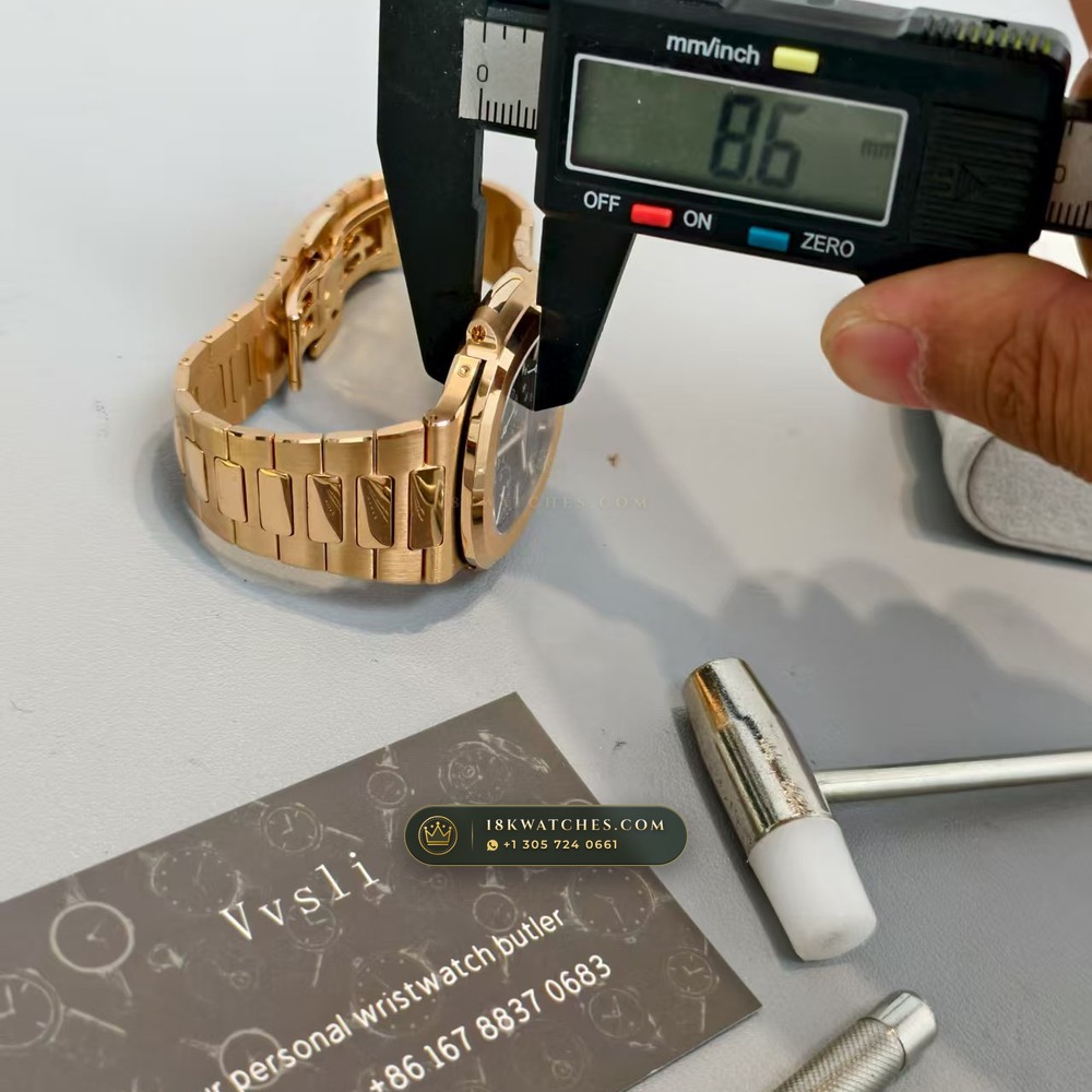Patek Philippe Nautilus Moonphase & Power Reserve 18K Rose Gold Ref. 5712R/001 — Studio Gallery Plate XII in 18K Rose Gold Au750 (105.9g Verified Mass, Patek Philippe Cal. 240 PS IRM C LU - 22K Gold Micro-Rotor)