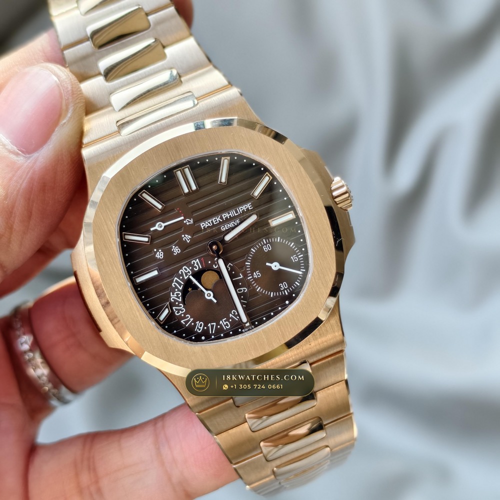 Patek Philippe Nautilus Moonphase & Power Reserve 18K Rose Gold Ref. 5712R/001 — Studio Gallery Plate III in 18K Rose Gold Au750 (105.9g Verified Mass, Patek Philippe Cal. 240 PS IRM C LU - 22K Gold Micro-Rotor)