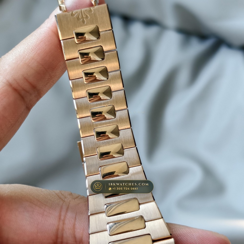 Patek Philippe Nautilus Moonphase & Power Reserve 18K Rose Gold Ref. 5712R/001 — Studio Gallery Plate IV in 18K Rose Gold Au750 (105.9g Verified Mass, Patek Philippe Cal. 240 PS IRM C LU - 22K Gold Micro-Rotor)
