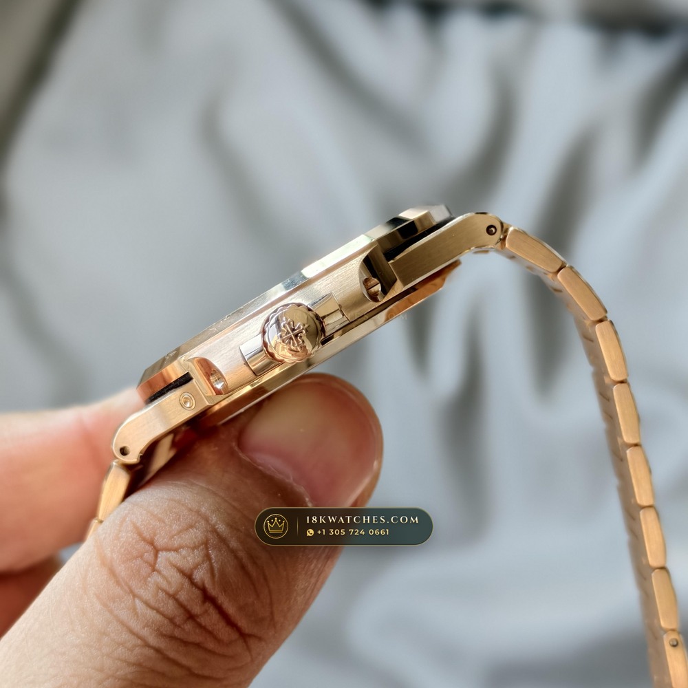 Patek Philippe Nautilus Moonphase & Power Reserve 18K Rose Gold Ref. 5712R/001 — Studio Gallery Plate V in 18K Rose Gold Au750 (105.9g Verified Mass, Patek Philippe Cal. 240 PS IRM C LU - 22K Gold Micro-Rotor)
