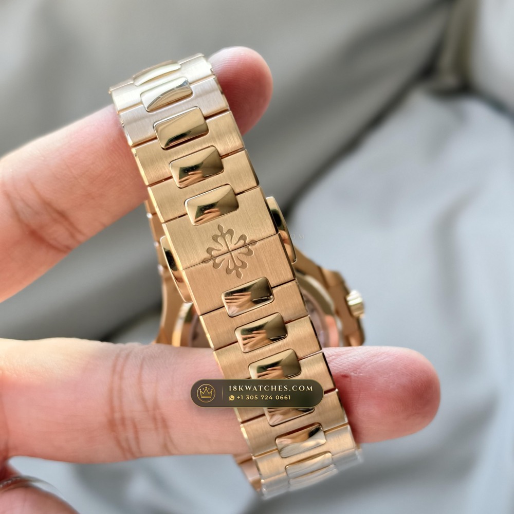 Patek Philippe Nautilus Moonphase & Power Reserve 18K Rose Gold Ref. 5712R/001 — Studio Gallery Plate VII in 18K Rose Gold Au750 (105.9g Verified Mass, Patek Philippe Cal. 240 PS IRM C LU - 22K Gold Micro-Rotor)