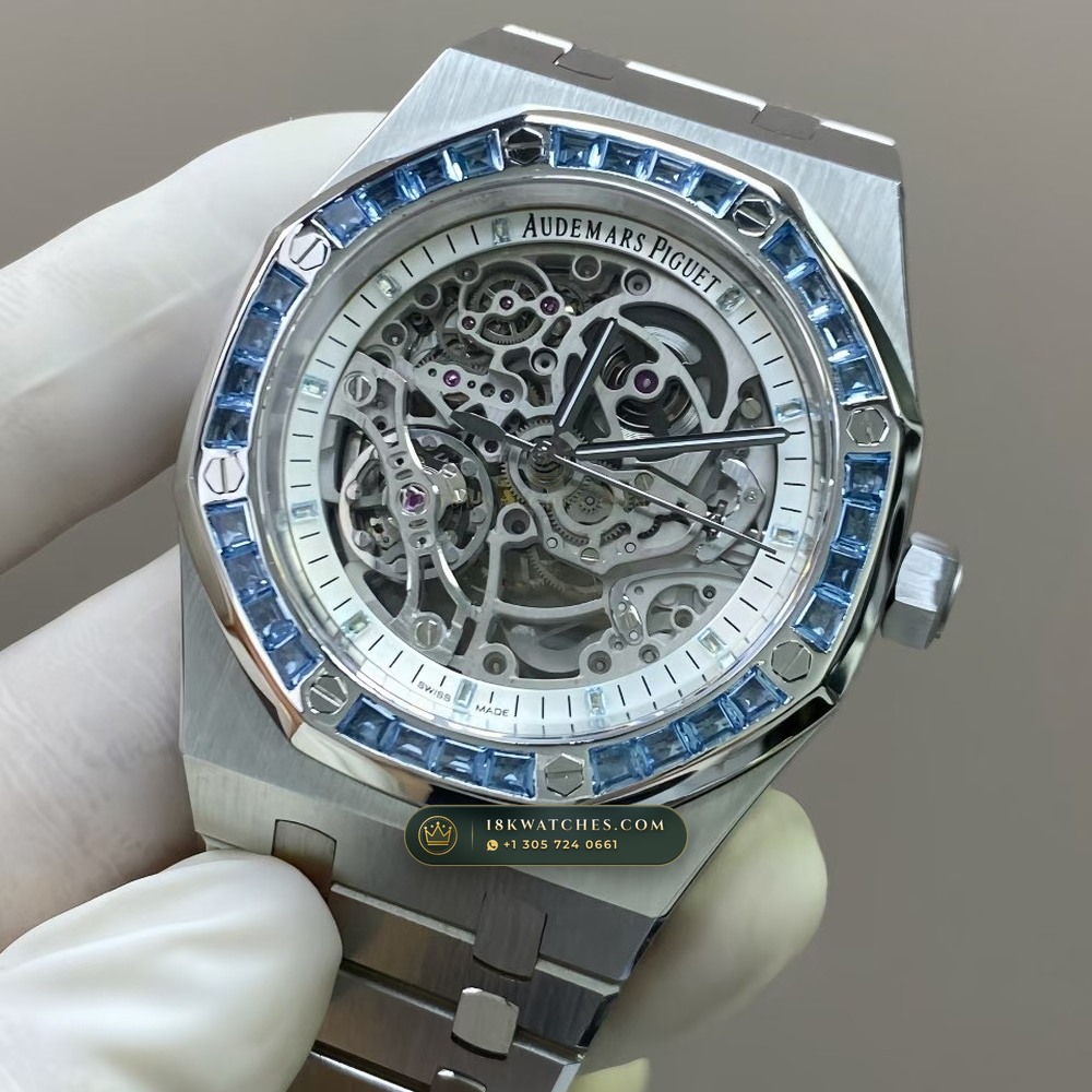 Audemars Piguet Royal Oak Double Balance Wheel Openworked 41mm Baguette Blue Topaz Bezel 18K White Gold Free-Sprung Calibre Ref. 15412BC.TO.1220BC.01 — Studio Gallery Plate II in 18K White Gold Au750 (224.5g Verified Mass, Audemars Piguet Cal. 3132 Dual-Balance Openworked)