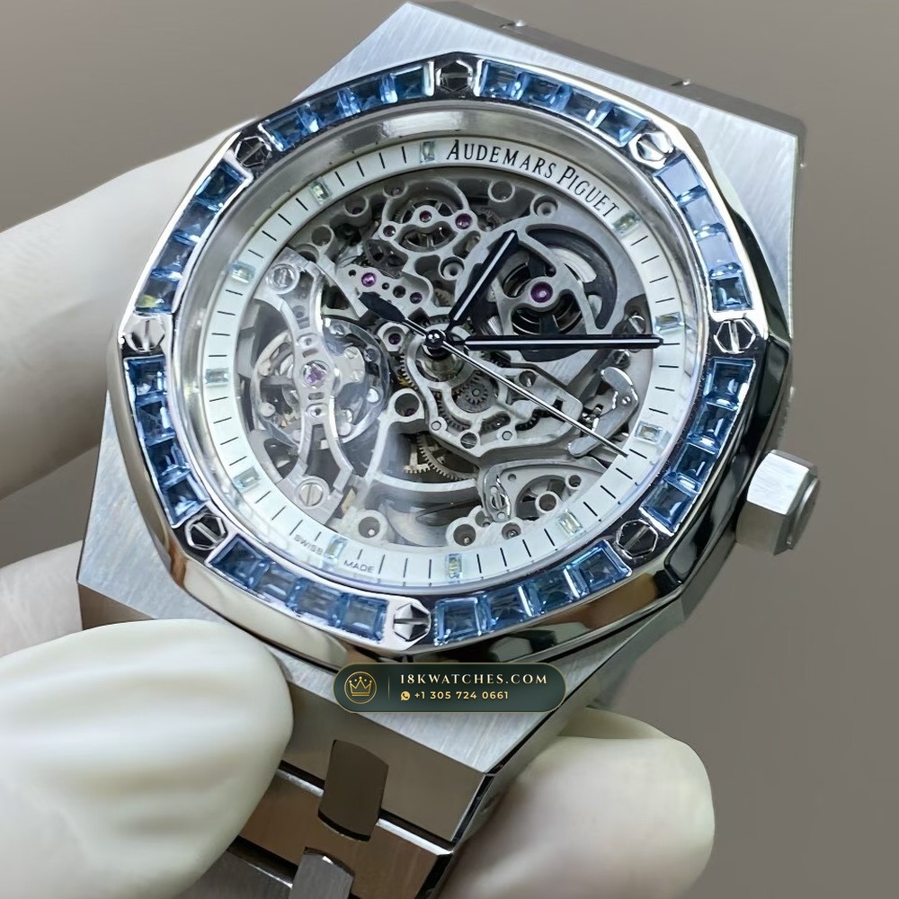 Audemars Piguet Royal Oak Double Balance Wheel Openworked 41mm Baguette Blue Topaz Bezel 18K White Gold Free-Sprung Calibre Ref. 15412BC.TO.1220BC.01 — Studio Gallery Plate III in 18K White Gold Au750 (224.5g Verified Mass, Audemars Piguet Cal. 3132 Dual-Balance Openworked)